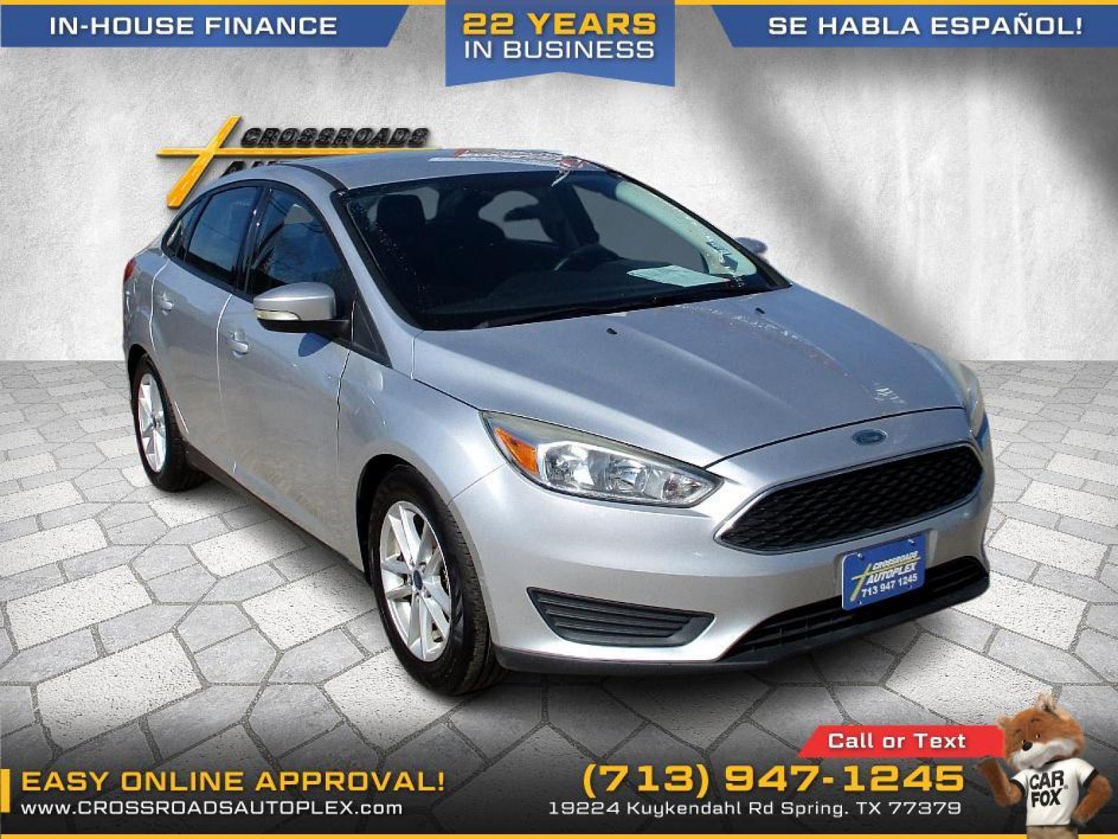 2015 SILVER FORD FOCUS SE Sedan (1FADP3F22FL) with an 2.0L L4 DOHC 16V engine, 5-SPEED MANUAL OR 6-SPEED AUTOMATIC transmission, located at 19224 Kuykendahl Rd, Spring, TX, 77379, (713) 947-1245, 30.049259, -95.491402 - Photo #0