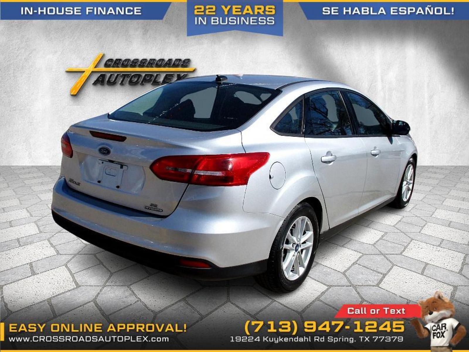 2015 SILVER FORD FOCUS SE Sedan (1FADP3F22FL) with an 2.0L L4 DOHC 16V engine, 5-SPEED MANUAL OR 6-SPEED AUTOMATIC transmission, located at 19224 Kuykendahl Rd, Spring, TX, 77379, (713) 947-1245, 30.049259, -95.491402 - Photo #2