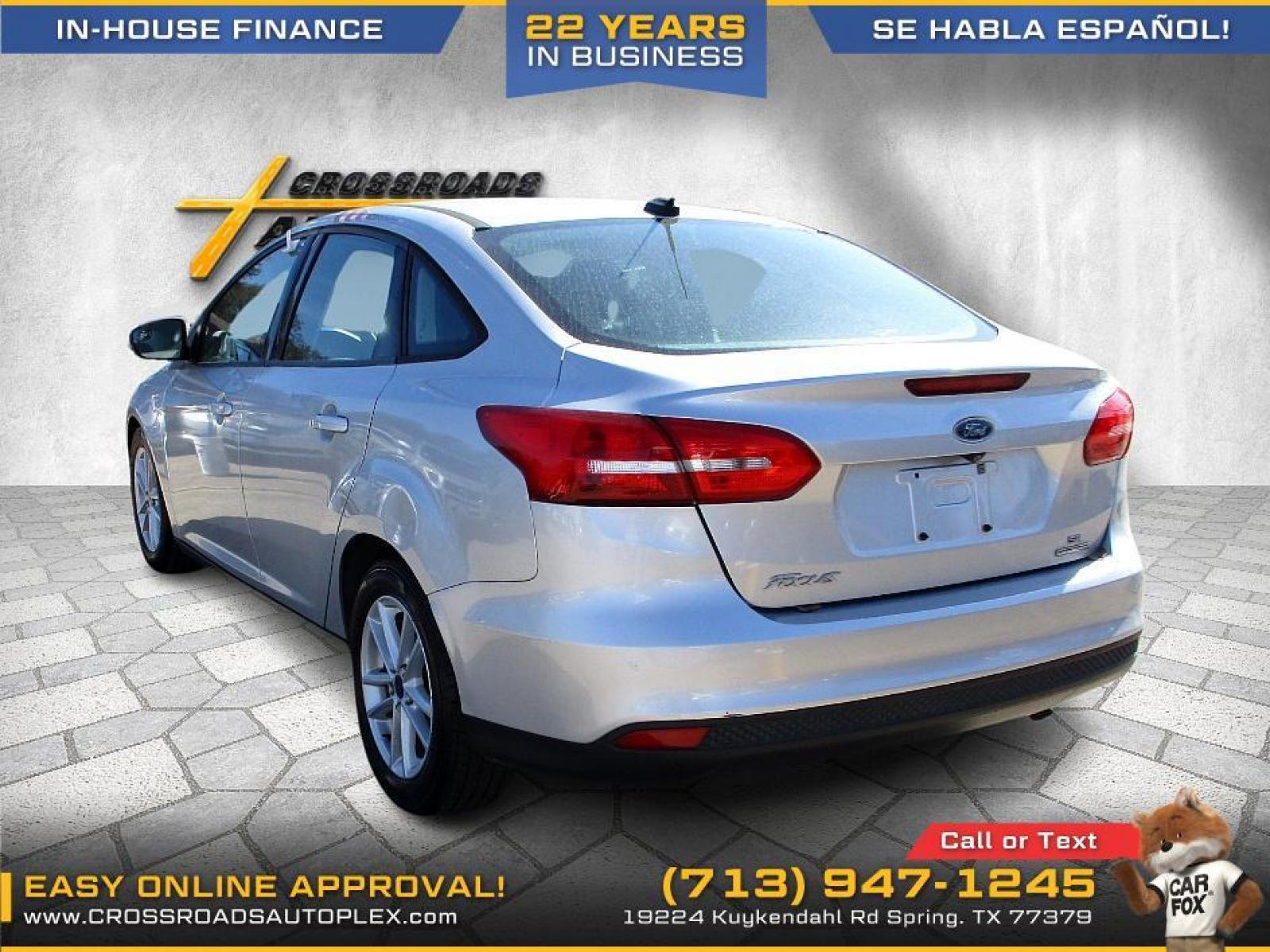 2015 SILVER FORD FOCUS SE Sedan (1FADP3F22FL) with an 2.0L L4 DOHC 16V engine, 5-SPEED MANUAL OR 6-SPEED AUTOMATIC transmission, located at 19224 Kuykendahl Rd, Spring, TX, 77379, (713) 947-1245, 30.049259, -95.491402 - Photo #4