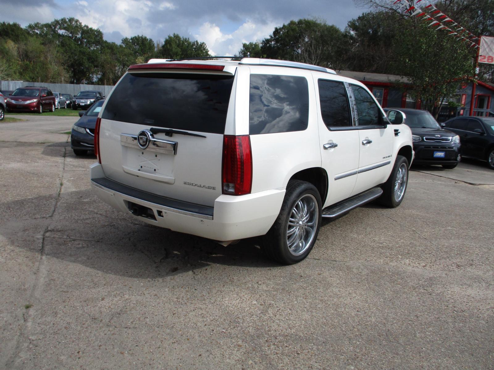 2007 WHITE CADILLAC ESCALADE 2WD (1GYEC63837R) with an 6.2L V8 OHV 16V engine, 6-SPEED AUTOMATIC transmission, located at 19224 Kuykendahl Rd, Spring, TX, 77379, (713) 947-1245, 30.049259, -95.491402 - If you're in the market for a luxury SUV, look no further! This vehicle is in pristine condition inside and out, has black leather seats, ice cold A/C and like new tires! Here at Crossroads Autoplex we want to help you drive off in your dream car today! Bad credit or No credit we want to make a d - Photo #2