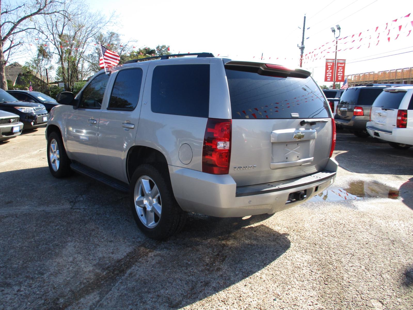 2007 BEIGE CHEVROLET TAHOE LTZ 2WD (1GNFC13J37R) with an 5.3L V8 OHV 16V engine, 4-SPEED AUTOMATIC transmission, located at 19224 Kuykendahl Rd, Spring, TX, 77379, (713) 947-1245, 30.049259, -95.491402 - LOOK!! NEW ARRIVAL CHEVROLET TAHOE, THIS TAHOE HAS GONE THROUGH LEGACY TRUCKS AND CARS MULTI-POINT INSPECTION AND READY FOR DELIVERY. THIS VEHICLE IS EQUIPPED WITH 3RD SEATING FOR THE WHOLE FAMILY. POWER WINDOWS AND LOCKS, TILT, GREAT SOUND SYSTEM, LEATHER INTERIOR. MOTOR AND TRANSMISSION RUNS GREAT - Photo #4