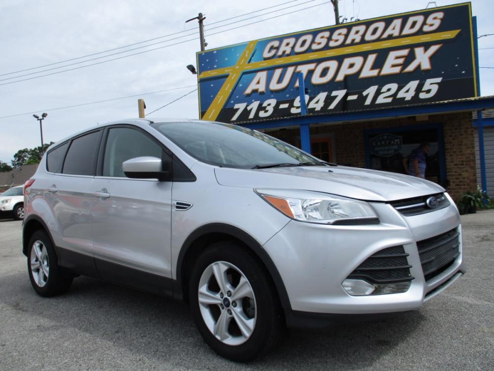 2015 GRAY FORD ESCAPE SE FWD (1FMCU0GX7FU) with an 1.6L L4 DOHC 16V engine, 6-SPEED AUTOMATIC transmission, located at 310 Spencer Hwy, South Houston, TX, 77587, (713) 947-1245, 29.664383, -95.228897 - LOOK WHAT JUST CAME IN INVENTORY, 2015 FORD ESCAPE THAT IS ONE OF KIND!! QUALIFIES FOR OUR IN-HOUSE FINANCING, ICE COLD A/C , POWER WINDOWS AND LOCKS, GREAT RUNNING ENGINE AND SMOOTH TRANSMISSION, THIS ESCAPE IS READY FOR DELIVERY , IT HAS GONE THROUGH A MULTI-POINT INSPECTIONS WITH ALMSOT NEW TIRES - Photo #0