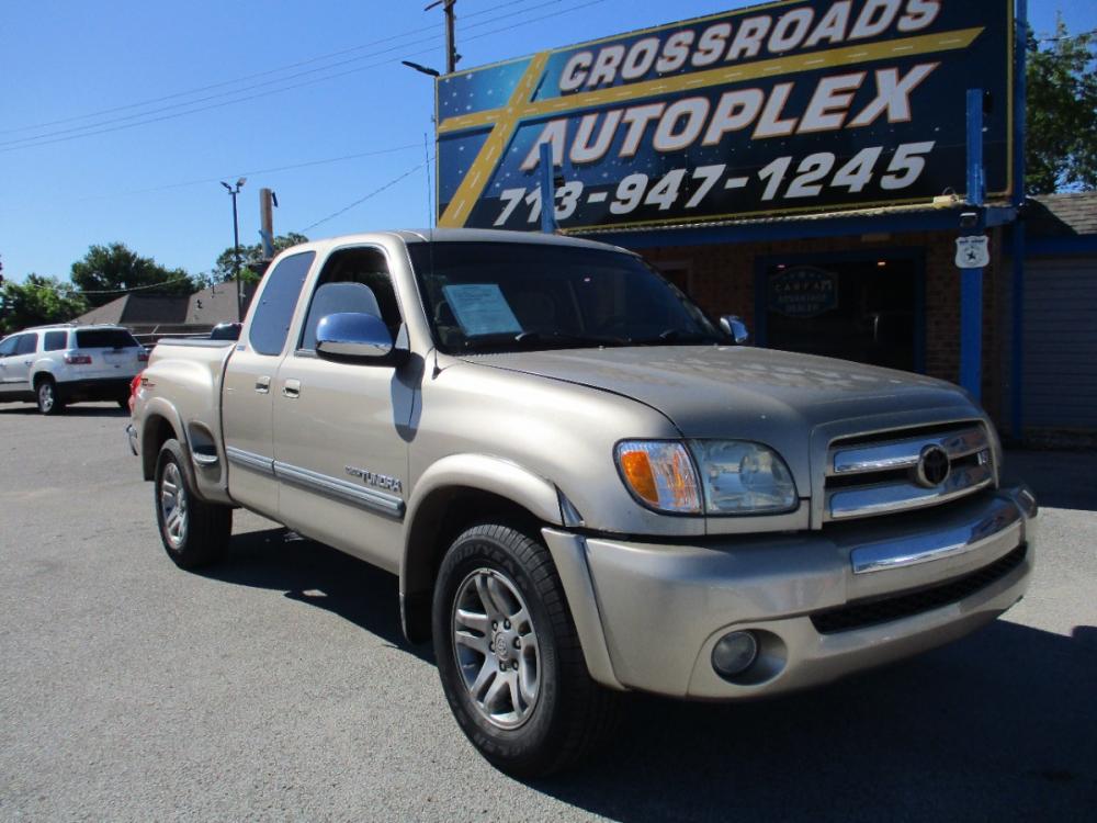2003 GOLD TOYOTA TUNDRA SR5 Access Cab 2WD (5TBRT34103S) with an 4.7L V8 DOHC 32V engine, 4-SPEED AUTOMATIC OR 5-SPEED MANUAL transmission, located at 310 Spencer Hwy, South Houston, TX, 77587, (713) 947-1245, 29.664383, -95.228897 - 2003 TOYOTA TUNDRA JUST HIT THE LOT TODAY!! DONT MISS THIS ONE, WONT BE HERE LONG! If your looking for a great truck this is it, With the advertised highest V-8 half-ton horse power and torque under the hood. The Tundra continues it's luxurious appointments with premium materials such as brushed - Photo #0