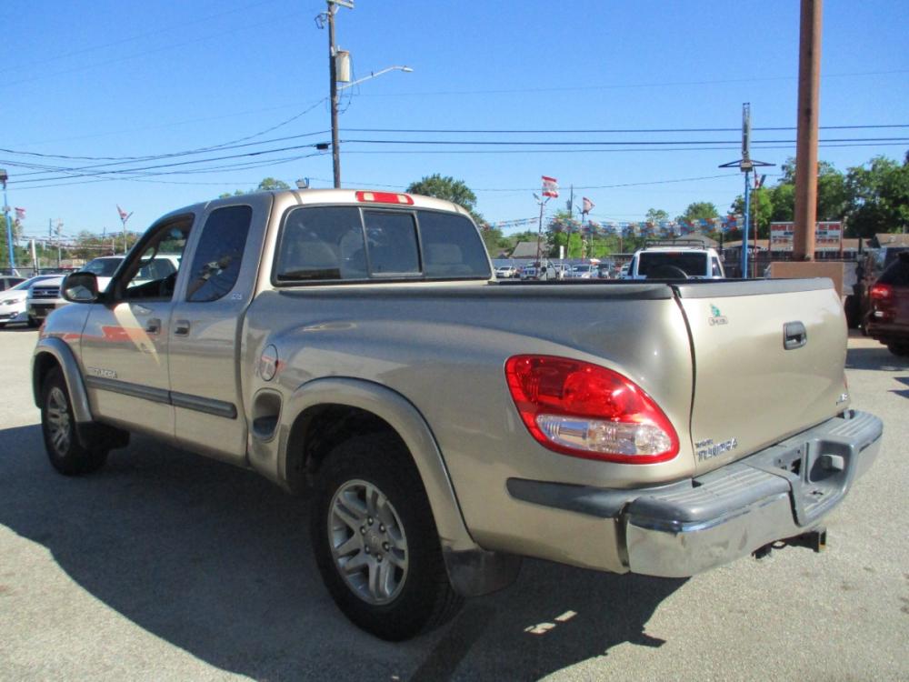 2003 GOLD TOYOTA TUNDRA SR5 Access Cab 2WD (5TBRT34103S) with an 4.7L V8 DOHC 32V engine, 4-SPEED AUTOMATIC OR 5-SPEED MANUAL transmission, located at 310 Spencer Hwy, South Houston, TX, 77587, (713) 947-1245, 29.664383, -95.228897 - 2003 TOYOTA TUNDRA JUST HIT THE LOT TODAY!! DONT MISS THIS ONE, WONT BE HERE LONG! If your looking for a great truck this is it, With the advertised highest V-8 half-ton horse power and torque under the hood. The Tundra continues it's luxurious appointments with premium materials such as brushed - Photo #4