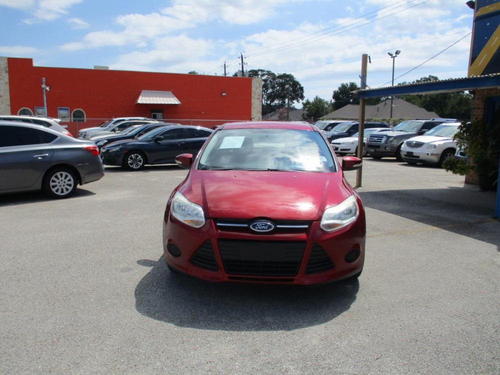 2013 MAROON FORD FOCUS SE Sedan (1FADP3F23DL) with an 2.0L L4 DOHC 16V engine, 5-SPEED MANUAL OR 6-SPEED AUTOMATIC transmission, located at 310 Spencer Hwy, South Houston, TX, 77587, (713) 947-1245, 29.664383, -95.228897 - It's like a brand new car. You won't believe how tight it drives. Aero-crisp. Sure-footed. Smart. Inspired. This unit has it all, including the admiration of some of the toughest critics in the world. In a single year, Focus was named “Best Car to Buy 2012” by TheCarConnection.com, “One of the - Photo #7