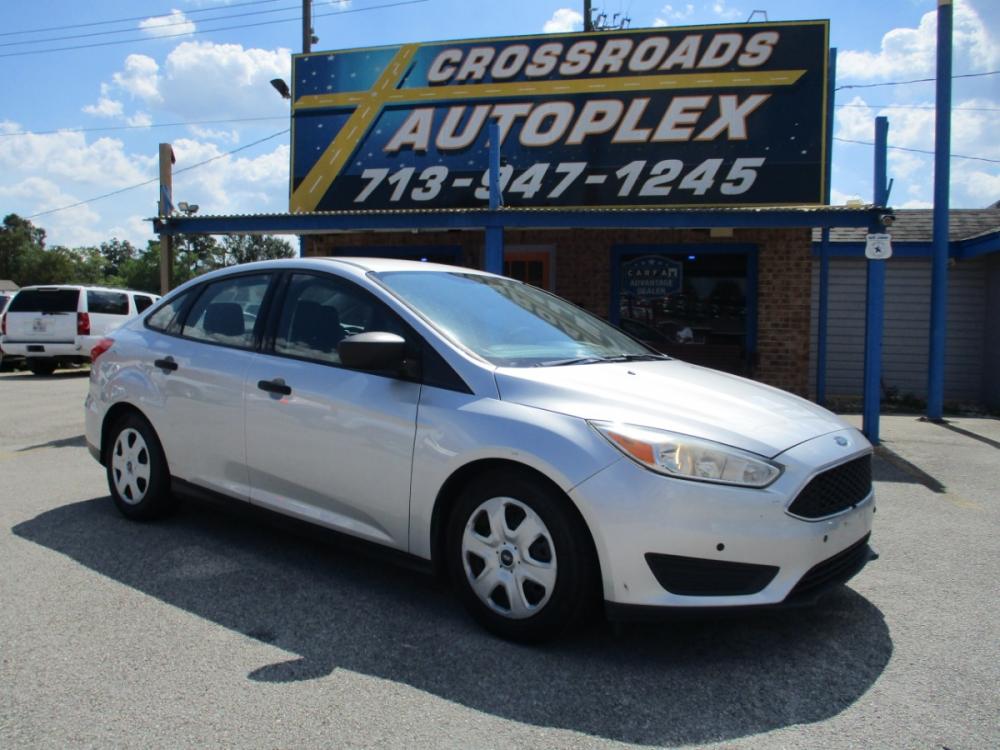 2016 SILVER FORD FOCUS S Sedan (1FADP3E26GL) with an 2.0L L4 DOHC 16V engine, AUTOMATIC transmission, located at 310 Spencer Hwy, South Houston, TX, 77587, (713) 947-1245, 29.664383, -95.228897 - It's like a brand new car. You won't believe how tight it drives. Aero-crisp. Sure-footed. Smart. Inspired. This unit has it all, including the admiration of some of the toughest critics in the world. In a single year, Focus was named “Best Car to Buy 2012” by TheCarConnection.com, “One of the - Photo #0