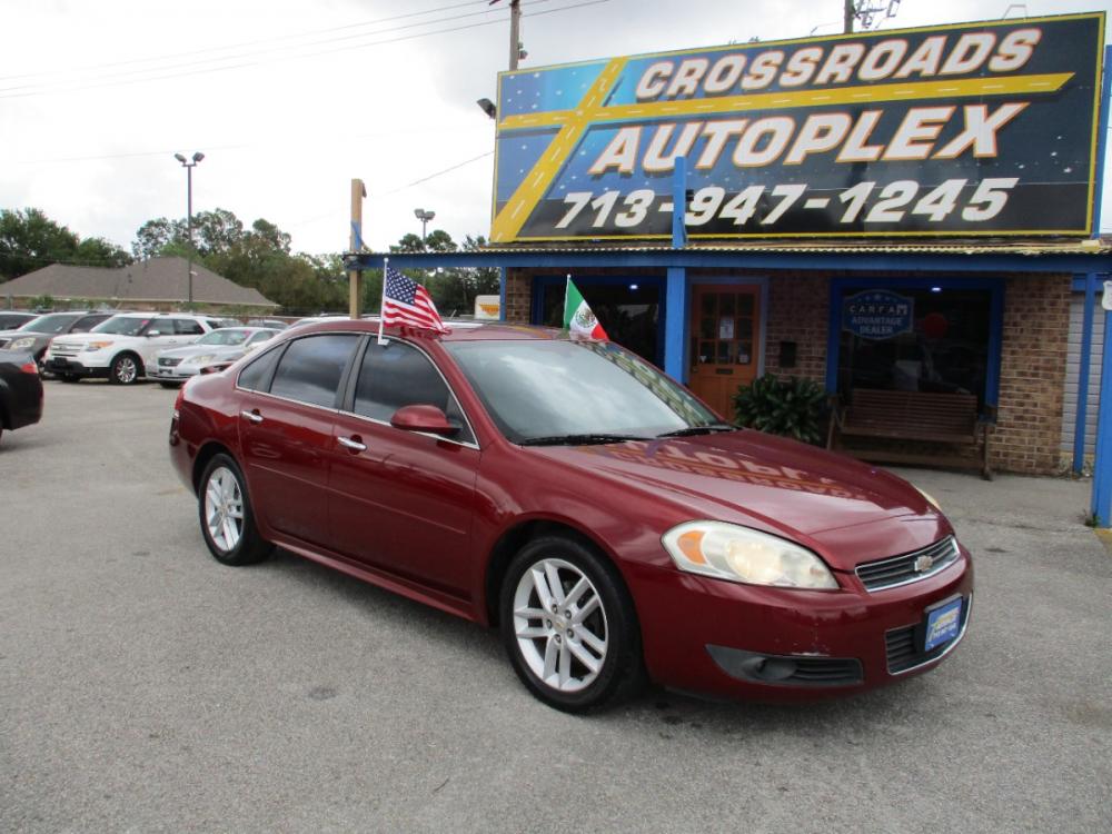 2011 RED CHEVROLET IMPALA LTZ (2G1WC5EM9B1) with an 3.9L V6 DOHC 16V FFV engine, 4-SPEED AUTOMATIC transmission, located at 310 Spencer Hwy, South Houston, TX, 77587, (713) 947-1245, 29.664383, -95.228897 - Photo #0