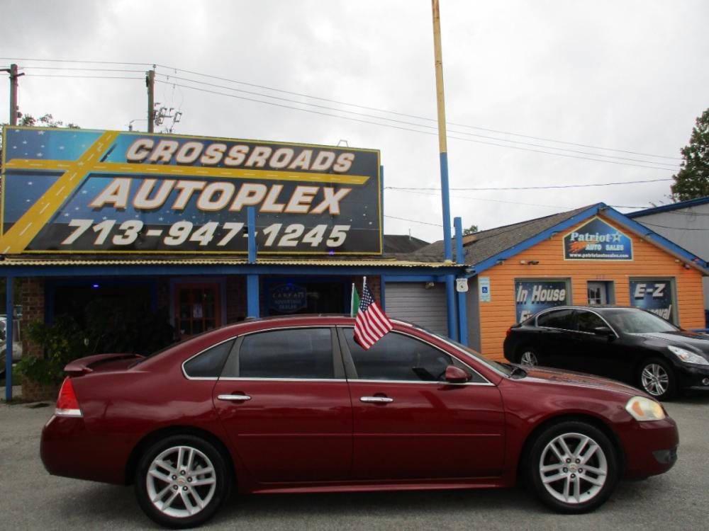 2011 RED CHEVROLET IMPALA LTZ (2G1WC5EM9B1) with an 3.9L V6 DOHC 16V FFV engine, 4-SPEED AUTOMATIC transmission, located at 310 Spencer Hwy, South Houston, TX, 77587, (713) 947-1245, 29.664383, -95.228897 - Photo #1