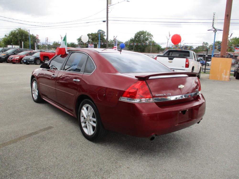 2011 RED CHEVROLET IMPALA LTZ (2G1WC5EM9B1) with an 3.9L V6 DOHC 16V FFV engine, 4-SPEED AUTOMATIC transmission, located at 310 Spencer Hwy, South Houston, TX, 77587, (713) 947-1245, 29.664383, -95.228897 - Photo #4