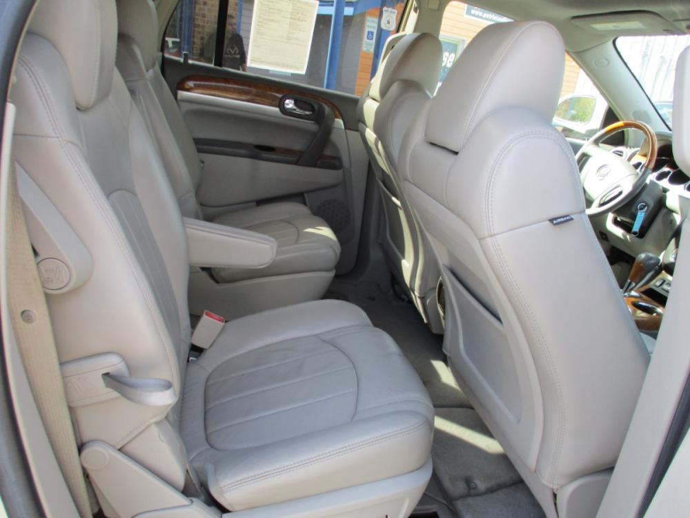 2010 WHITE BUICK ENCLAVE CXL 2XL FWD (5GALRCED0AJ) with an 3.6L V6 DOHC 24V engine, 6-SPEED AUTOMATIC OVERDRIVE transmission, located at 310 Spencer Hwy, South Houston, TX, 77587, (713) 947-1245, 29.664383, -95.228897 - The first thing you’ll feel in the mid-size Enclave is a sense of openness. A “low and away” instrument panel keeps controls easily within reach. Premium materials, cloth-appointed seating, warm wood tones and brushed chrome accents create a sophisticated interior. Take comfort in the fact tha - Photo #10