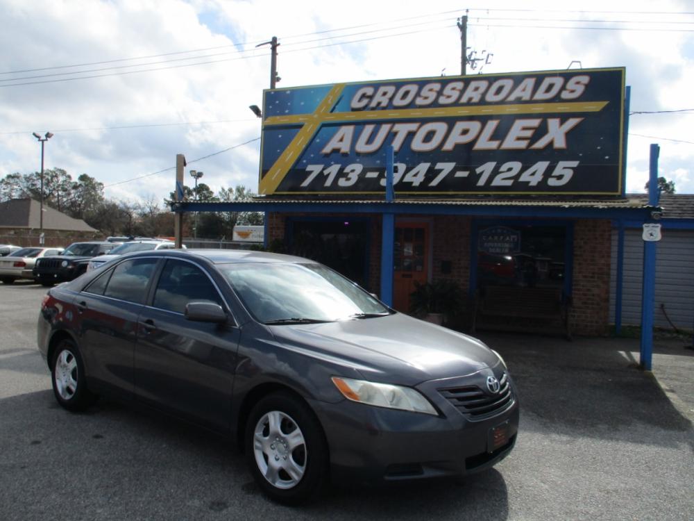 2009 GRAY TOYOTA CAMRY CE 5-Spd AT (4T1BE46K89U) with an 2.4L L4 DOHC 16V engine, 5-SPEED AUTOMATIC transmission, located at 310 Spencer Hwy, South Houston, TX, 77587, (713) 947-1245, 29.664383, -95.228897 - 2009 TOYOTA CAMRY THAT JUST HIT THE LOT!! DONT WANT TO MISS THIS ONE, XTRA CLEAN 4-DOOR FULL SIZE SEDAN JUST ADDED TO OUR INVENTORY, SMOOTH DRIVE INTERIOR OF VEHICLE IS XTRA CLEAN WITH LEATHER SEATS & NO STAINS OR CUTS. EXTERIOR IS EQUALLY AS NICE WITH NO DOOR DINGS ! THIS VEHICLE QUALIFIES FOR OUR - Photo #0