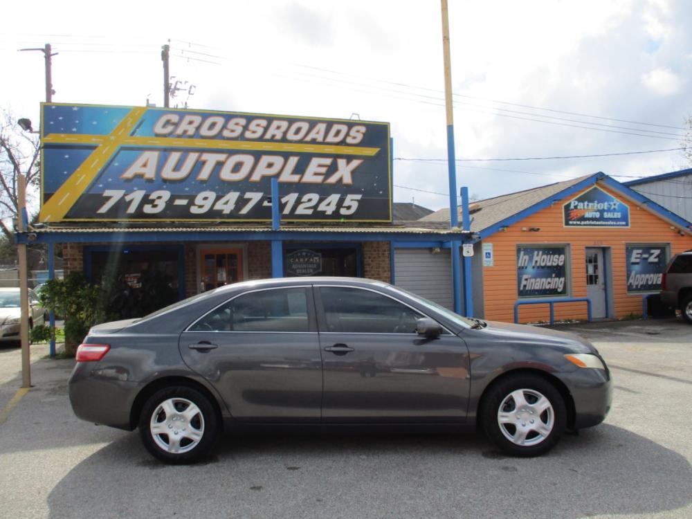 2009 GRAY TOYOTA CAMRY CE 5-Spd AT (4T1BE46K89U) with an 2.4L L4 DOHC 16V engine, 5-SPEED AUTOMATIC transmission, located at 310 Spencer Hwy, South Houston, TX, 77587, (713) 947-1245, 29.664383, -95.228897 - 2009 TOYOTA CAMRY THAT JUST HIT THE LOT!! DONT WANT TO MISS THIS ONE, XTRA CLEAN 4-DOOR FULL SIZE SEDAN JUST ADDED TO OUR INVENTORY, SMOOTH DRIVE INTERIOR OF VEHICLE IS XTRA CLEAN WITH LEATHER SEATS & NO STAINS OR CUTS. EXTERIOR IS EQUALLY AS NICE WITH NO DOOR DINGS ! THIS VEHICLE QUALIFIES FOR OUR - Photo #1