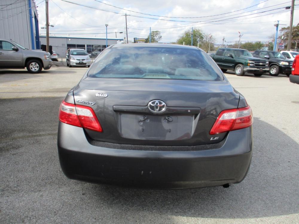 2009 GRAY TOYOTA CAMRY CE 5-Spd AT (4T1BE46K89U) with an 2.4L L4 DOHC 16V engine, 5-SPEED AUTOMATIC transmission, located at 310 Spencer Hwy, South Houston, TX, 77587, (713) 947-1245, 29.664383, -95.228897 - 2009 TOYOTA CAMRY THAT JUST HIT THE LOT!! DONT WANT TO MISS THIS ONE, XTRA CLEAN 4-DOOR FULL SIZE SEDAN JUST ADDED TO OUR INVENTORY, SMOOTH DRIVE INTERIOR OF VEHICLE IS XTRA CLEAN WITH LEATHER SEATS & NO STAINS OR CUTS. EXTERIOR IS EQUALLY AS NICE WITH NO DOOR DINGS ! THIS VEHICLE QUALIFIES FOR OUR - Photo #3
