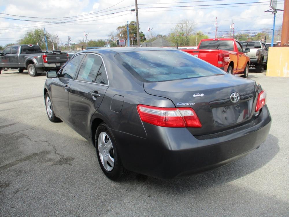 2009 GRAY TOYOTA CAMRY CE 5-Spd AT (4T1BE46K89U) with an 2.4L L4 DOHC 16V engine, 5-SPEED AUTOMATIC transmission, located at 310 Spencer Hwy, South Houston, TX, 77587, (713) 947-1245, 29.664383, -95.228897 - 2009 TOYOTA CAMRY THAT JUST HIT THE LOT!! DONT WANT TO MISS THIS ONE, XTRA CLEAN 4-DOOR FULL SIZE SEDAN JUST ADDED TO OUR INVENTORY, SMOOTH DRIVE INTERIOR OF VEHICLE IS XTRA CLEAN WITH LEATHER SEATS & NO STAINS OR CUTS. EXTERIOR IS EQUALLY AS NICE WITH NO DOOR DINGS ! THIS VEHICLE QUALIFIES FOR OUR - Photo #4