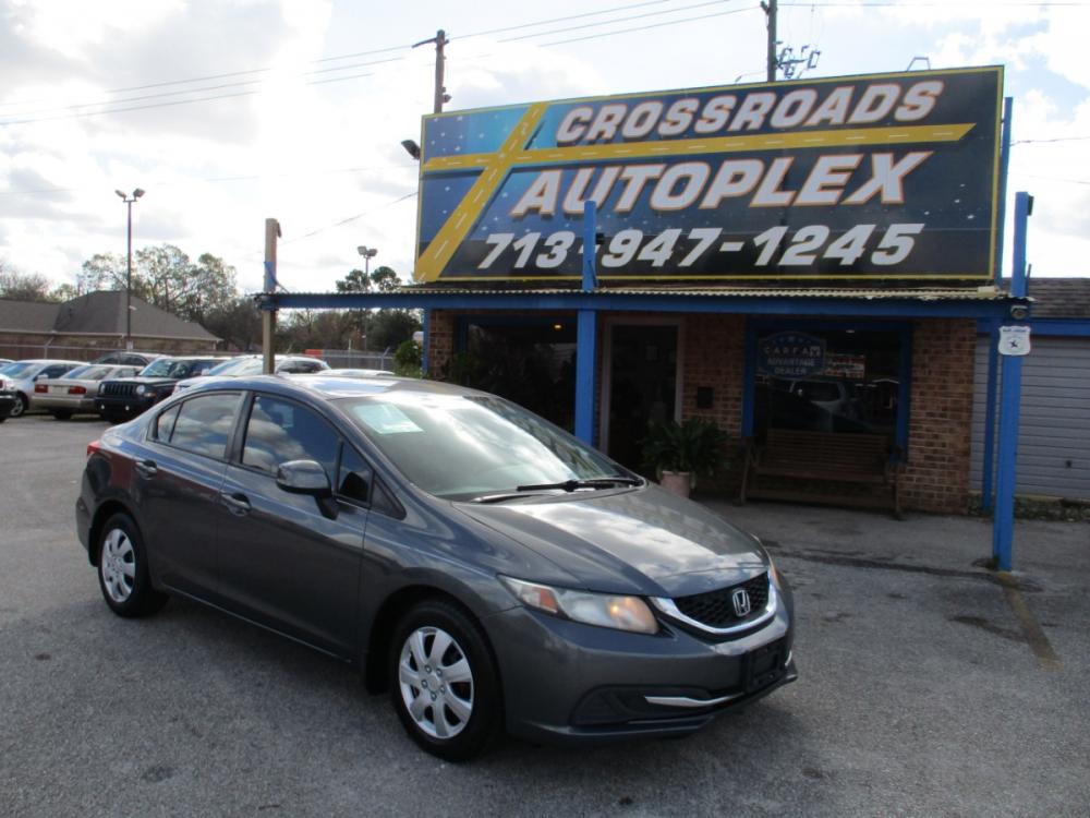 2013 GRAY HONDA CIVIC LX Sedan 5-Speed AT (2HGFB2F53DH) with an 1.8L L4 SOHC 16V engine, 5-SPEED AUTOMATIC transmission, located at 310 Spencer Hwy, South Houston, TX, 77587, (713) 947-1245, 29.664383, -95.228897 - This Honda Civic is a great example of leading-edge combination of killer looks, next-big-thing technology and huge driving fun. Civic embodies our safety for everyone philosophy. Bottom line is it is clean with a lot of options, it's safe with our 24-point multi-inspection by our ASE Certified tech - Photo #0