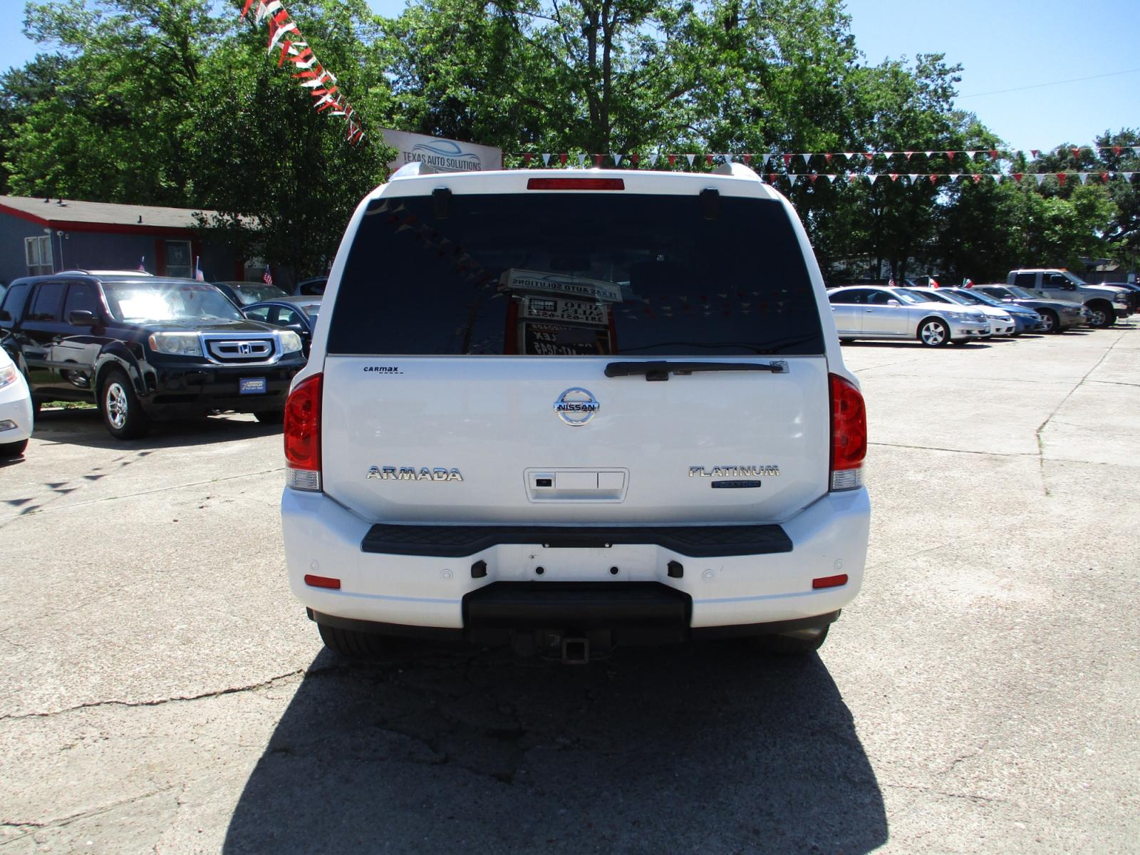 2010 WHITE NISSAN ARMADA SE 2WD (5N1BA0ND2AN) with an 5.6L V8 DOHC 32V FFV engine, 5-SPEED AUTOMATIC transmission, located at 19224 Kuykendahl Rd, Spring, TX, 77379, (713) 947-1245, 30.049259, -95.491402 - LOOK!! NEW ARRIVAL NISSAN ARMADA, THIS ARMADA HAS GONE THROUGH CROSSROADS AUTOPLEX MULTI-POINT INSPECTION AND READY FOR DELIVERY. THIS VEHICLE IS EQUIPPED WITH 3RD SEATING FOR THE WHOLE FAMILY. POWER WINDOWS AND LOCKS, TILT, GREAT SOUND SYSTEM, LEATHER INTERIOR. MOTOR AND TRANSMISSION RUNS GREAT AND - Photo #3