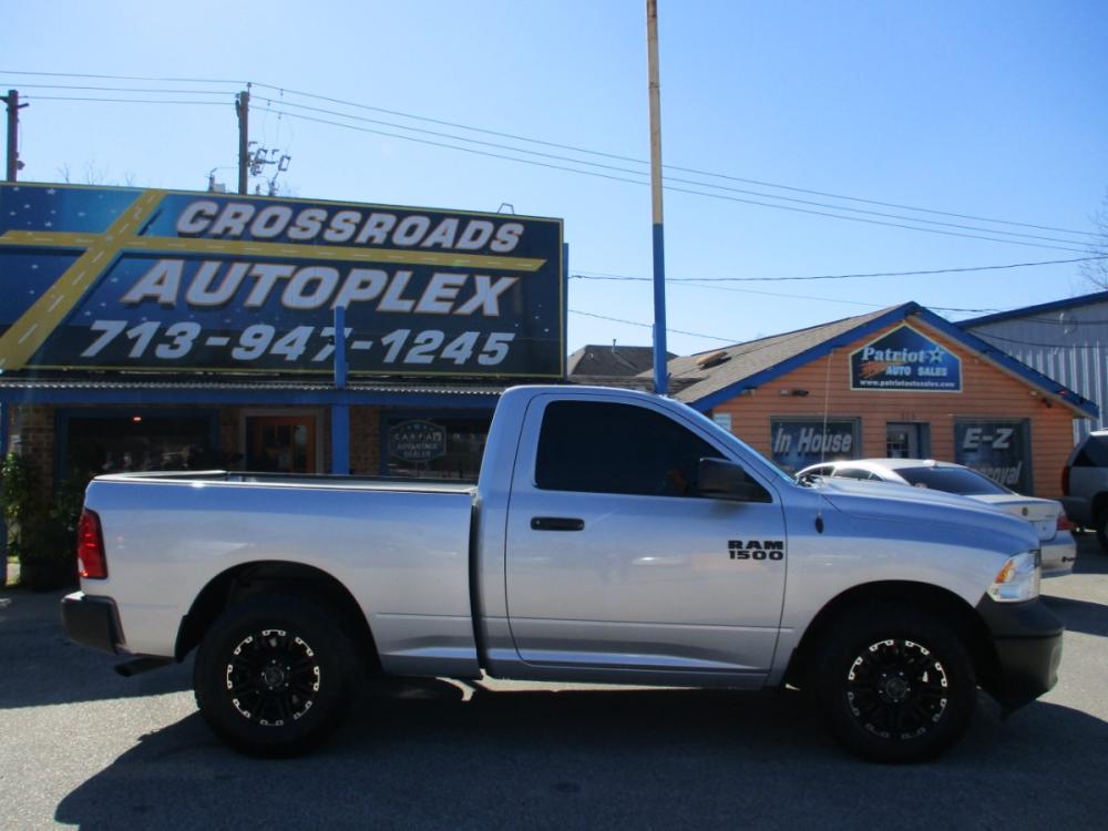 2015 SILVER RAM 1500 Tradesman Regular Cab SWB 2WD (3C6JR6AG5FG) with an 3.6L V6 DOHC 24V FFV engine, 8-SPEED AUTOMATIC transmission, located at 310 Spencer Hwy, South Houston, TX, 77587, (713) 947-1245, 29.664383, -95.228897 - 2015 DODGE RAM TRUCK!! This unit is clean and more power than you could ever want from a half ton truck. It's equipped with the two door . Cold AC, and it's been through our 24 multi-point inspection so you can rest assured that your buying a quality pre-owned vehicle. Come check t out today! See f - Photo #1