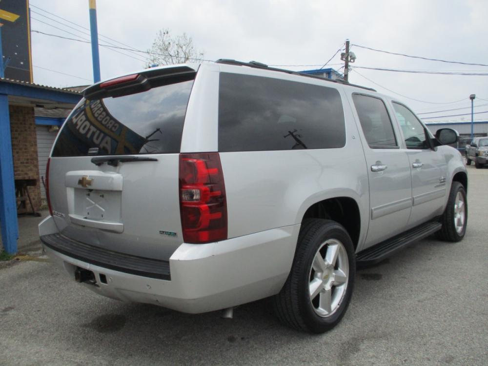 2011 SILVER CHEVROLET SUBURBAN LT 1500 2WD (1GNSCJE09BR) with an 5.3L V8 OHV 16V FFV engine, 6-SPEED AUTOMATIC transmission, located at 310 Spencer Hwy, South Houston, TX, 77587, (713) 947-1245, 29.664383, -95.228897 - LOOK!! NEW ARRIVAL CHEVROLET SUBURBAN LT, THIS SUBURBAN HAS GONE THROUGH LEGACY TRUCKS AND CARS MULTI-POINT INSPECTION AND READY FOR DELIVERY. THIS VEHICLE IS EQUIPPED WITH 3RD SEATING FOR THE WHOLE FAMILY. POWER WINDOWS AND LOCKS, TILT, GREAT SOUND SYSTEM, LEATHER INTERIOR. MOTOR AND TRANSMISSION R - Photo #2
