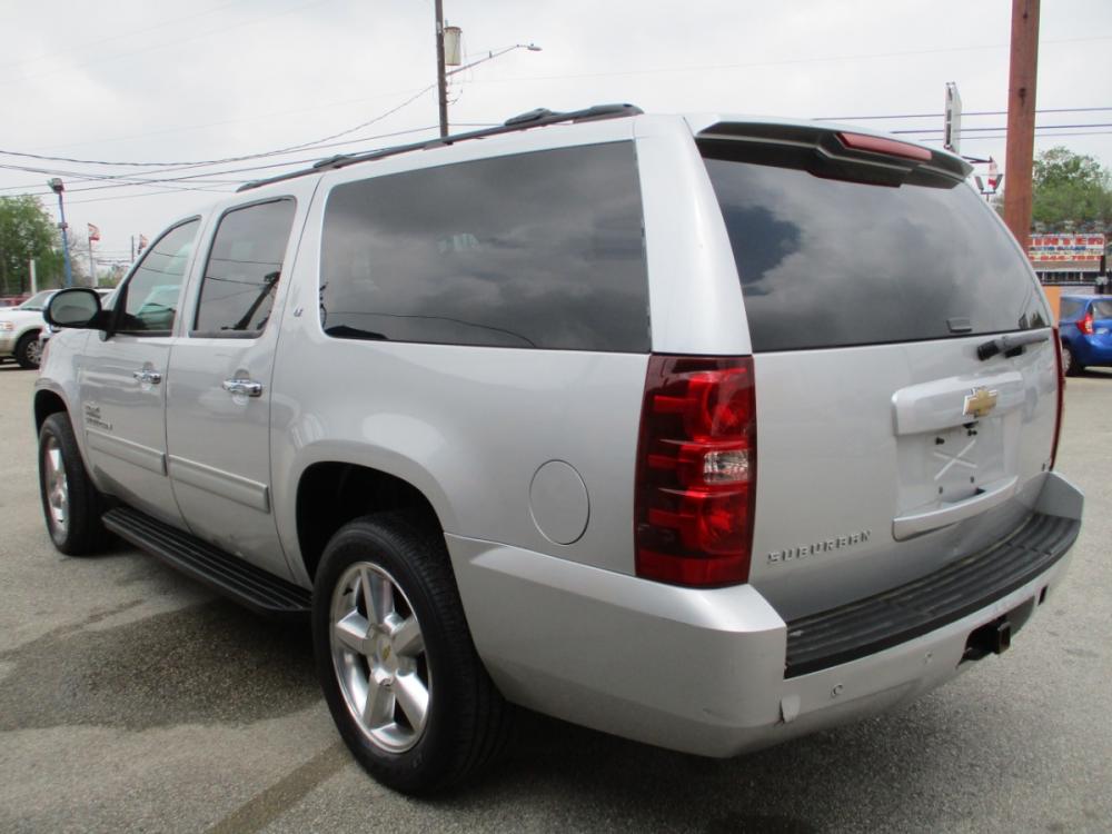 2011 SILVER CHEVROLET SUBURBAN LT 1500 2WD (1GNSCJE09BR) with an 5.3L V8 OHV 16V FFV engine, 6-SPEED AUTOMATIC transmission, located at 310 Spencer Hwy, South Houston, TX, 77587, (713) 947-1245, 29.664383, -95.228897 - LOOK!! NEW ARRIVAL CHEVROLET SUBURBAN LT, THIS SUBURBAN HAS GONE THROUGH LEGACY TRUCKS AND CARS MULTI-POINT INSPECTION AND READY FOR DELIVERY. THIS VEHICLE IS EQUIPPED WITH 3RD SEATING FOR THE WHOLE FAMILY. POWER WINDOWS AND LOCKS, TILT, GREAT SOUND SYSTEM, LEATHER INTERIOR. MOTOR AND TRANSMISSION R - Photo #4