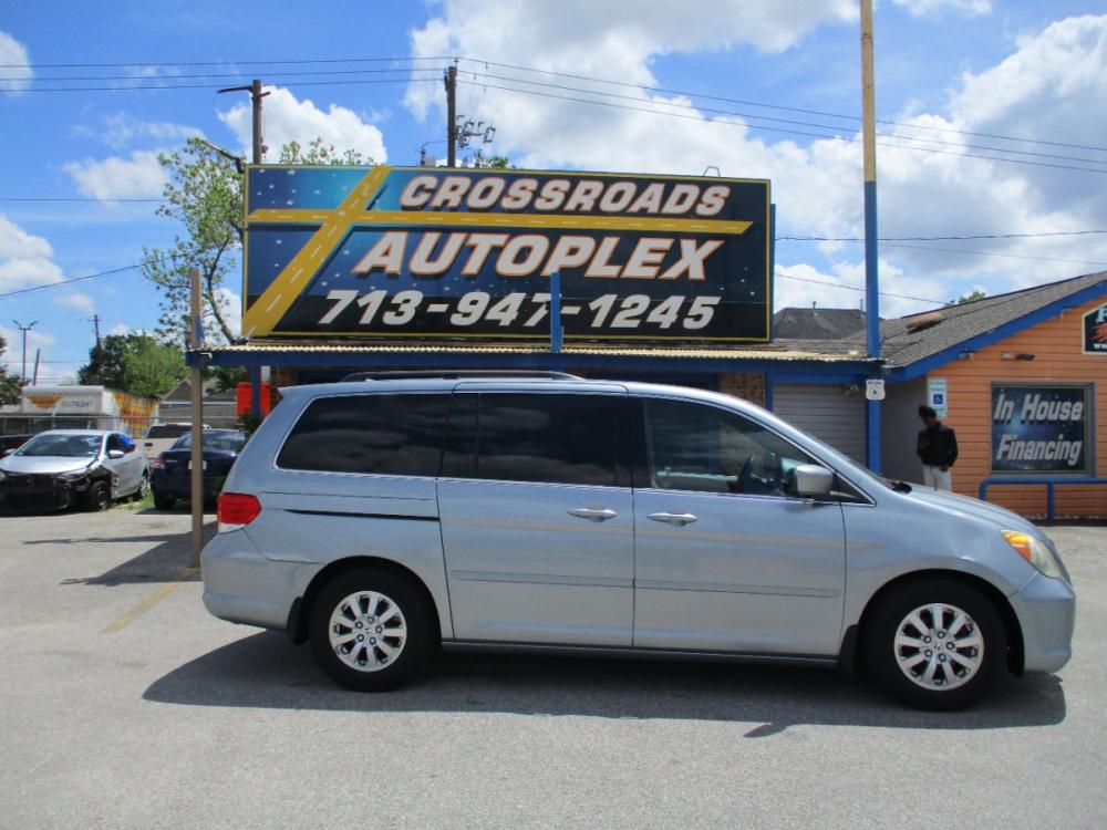 2008 SILVER HONDA ODYSSEY EX-L w/ DVD (5FNRL38708B) with an 3.5L V6 SOHC 24V engine, 5-SPEED AUTOMATIC transmission, located at 310 Spencer Hwy, South Houston, TX, 77587, (713) 947-1245, 29.664383, -95.228897 - This Honda Pilot has towing capacity, feels big behind the wheel. A huge pro for this unit is the roomy interior with eight-passenger seating, versatile storage and cargo-hauling abilities, many standard features, comfortable ride, smooth power delivery. Edmunds Say: One of the best crossover SUVs a - Photo #1