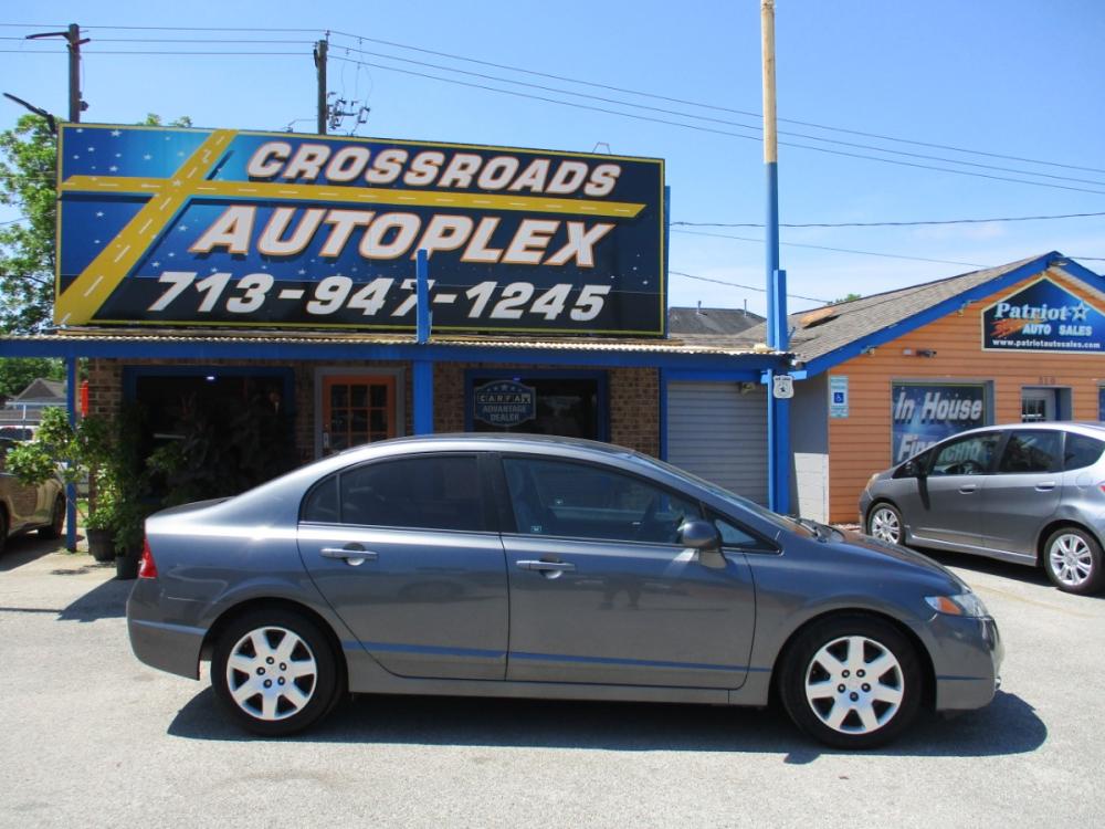 2010 GRAY HONDA CIVIC LX Sedan 5-Speed AT (19XFA1F53AE) with an 1.8L L4 SOHC 16V engine, 5-SPEED AUTOMATIC transmission, located at 310 Spencer Hwy, South Houston, TX, 77587, (713) 947-1245, 29.664383, -95.228897 - Photo #1