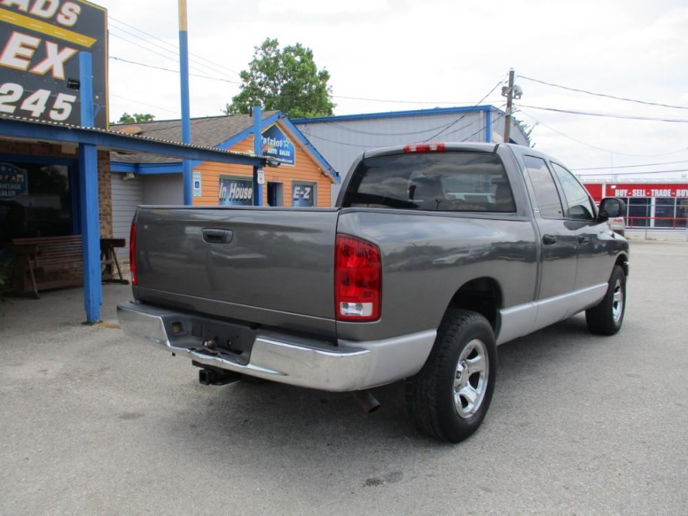 2002 GRAY DODGE RAM 1500 ST Quad Cab Short Bed 2WD (3D7HA18Z92G) with an 5.9L V8 OHV 16V engine, 4-SPEED AUTOMATIC OR 5-SPEED MANUAL transmission, located at 310 Spencer Hwy, South Houston, TX, 77587, (713) 947-1245, 29.664383, -95.228897 - 2002 DODGE RAM, THIS TRUCK IS IN PRISTINE CONDITION. Wow check out those 44K LOW MILES. This unit is clean and more power than you could ever want from a half ton truck. It's equipped with the four door crew cab so you'll have plenty of room for the whole family or all your friends. Cold AC, and i - Photo #2