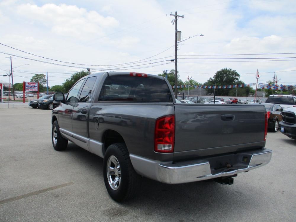 2002 GRAY DODGE RAM 1500 ST Quad Cab Short Bed 2WD (3D7HA18Z92G) with an 5.9L V8 OHV 16V engine, 4-SPEED AUTOMATIC OR 5-SPEED MANUAL transmission, located at 310 Spencer Hwy, South Houston, TX, 77587, (713) 947-1245, 29.664383, -95.228897 - 2002 DODGE RAM, THIS TRUCK IS IN PRISTINE CONDITION. Wow check out those 44K LOW MILES. This unit is clean and more power than you could ever want from a half ton truck. It's equipped with the four door crew cab so you'll have plenty of room for the whole family or all your friends. Cold AC, and i - Photo #4
