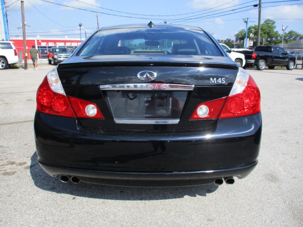 2007 BLACK INFINITI M 45 Sedan (JNKBY01E87M) with an 4.5L V8 DOHC 32V engine, 5-SPEED AUTOMATIC transmission, located at 310 Spencer Hwy, South Houston, TX, 77587, (713) 947-1245, 29.664383, -95.228897 - Wow, this Infiniti unit is designed to enrich and crafted to perform. The premium automotive machinery is Premium after market only part of a premium automotive experience. Ice cold Ac, great mileage- Non smoker vehicle . An amazing Bose premium audio system with 8-inch display. It, clean with it's - Photo #3