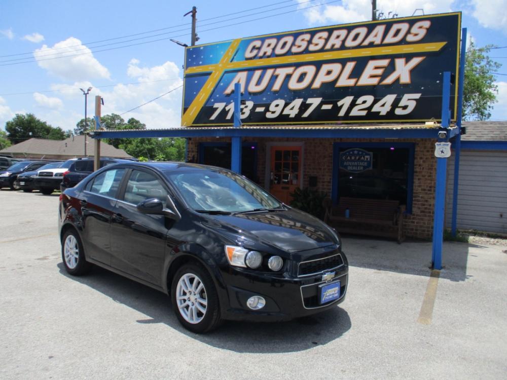 2012 BLACK CHEVROLET SONIC 2LT Sedan (1G1JC5SH9C4) with an 1.8L L4 DOHC 24V engine, 6-SPEED AUTOMATIC transmission, located at 310 Spencer Hwy, South Houston, TX, 77587, (713) 947-1245, 29.664383, -95.228897 - Photo #0