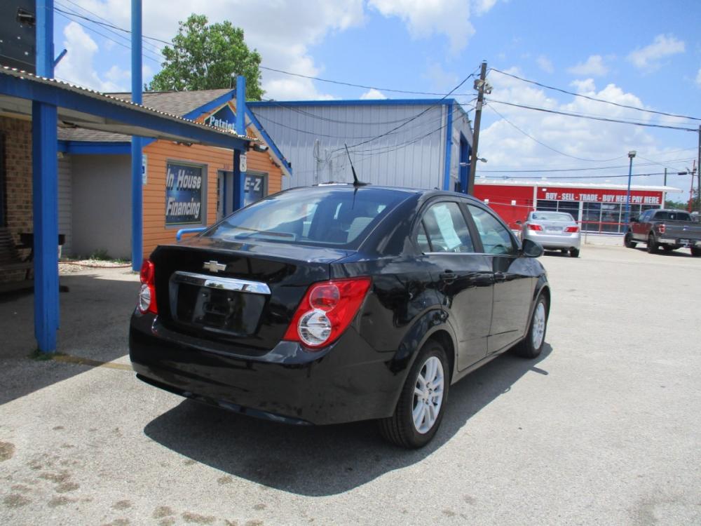 2012 BLACK CHEVROLET SONIC 2LT Sedan (1G1JC5SH9C4) with an 1.8L L4 DOHC 24V engine, 6-SPEED AUTOMATIC transmission, located at 310 Spencer Hwy, South Houston, TX, 77587, (713) 947-1245, 29.664383, -95.228897 - Photo #2