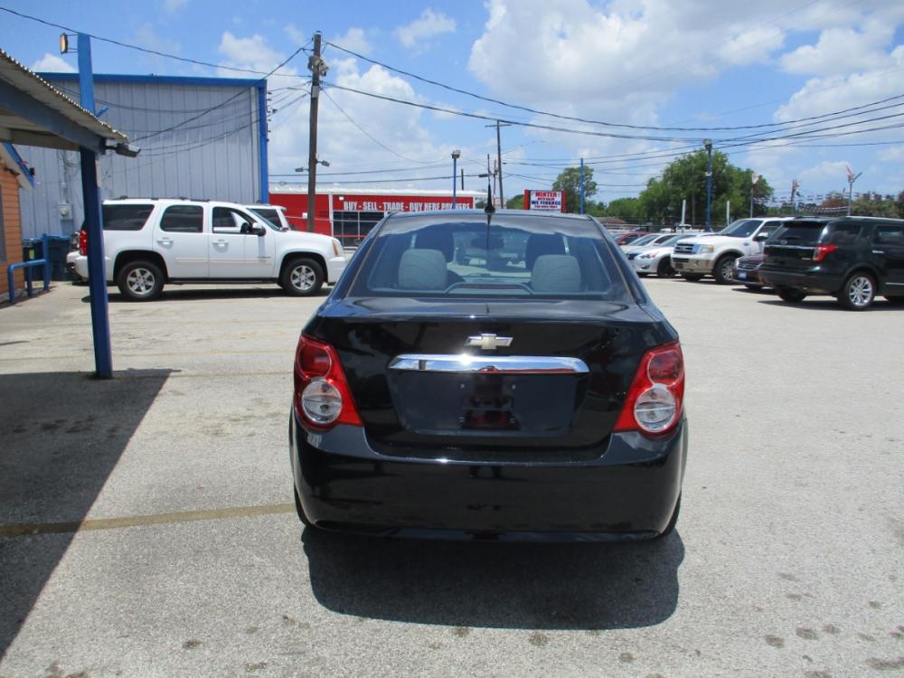 2012 BLACK CHEVROLET SONIC 2LT Sedan (1G1JC5SH9C4) with an 1.8L L4 DOHC 24V engine, 6-SPEED AUTOMATIC transmission, located at 310 Spencer Hwy, South Houston, TX, 77587, (713) 947-1245, 29.664383, -95.228897 - Photo #3