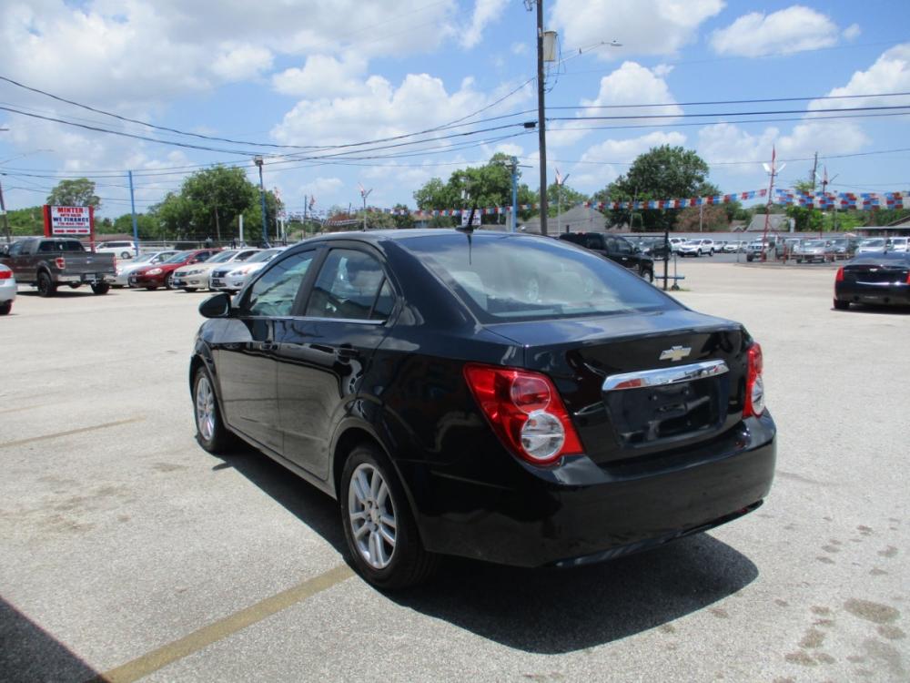 2012 BLACK CHEVROLET SONIC 2LT Sedan (1G1JC5SH9C4) with an 1.8L L4 DOHC 24V engine, 6-SPEED AUTOMATIC transmission, located at 310 Spencer Hwy, South Houston, TX, 77587, (713) 947-1245, 29.664383, -95.228897 - Photo #4