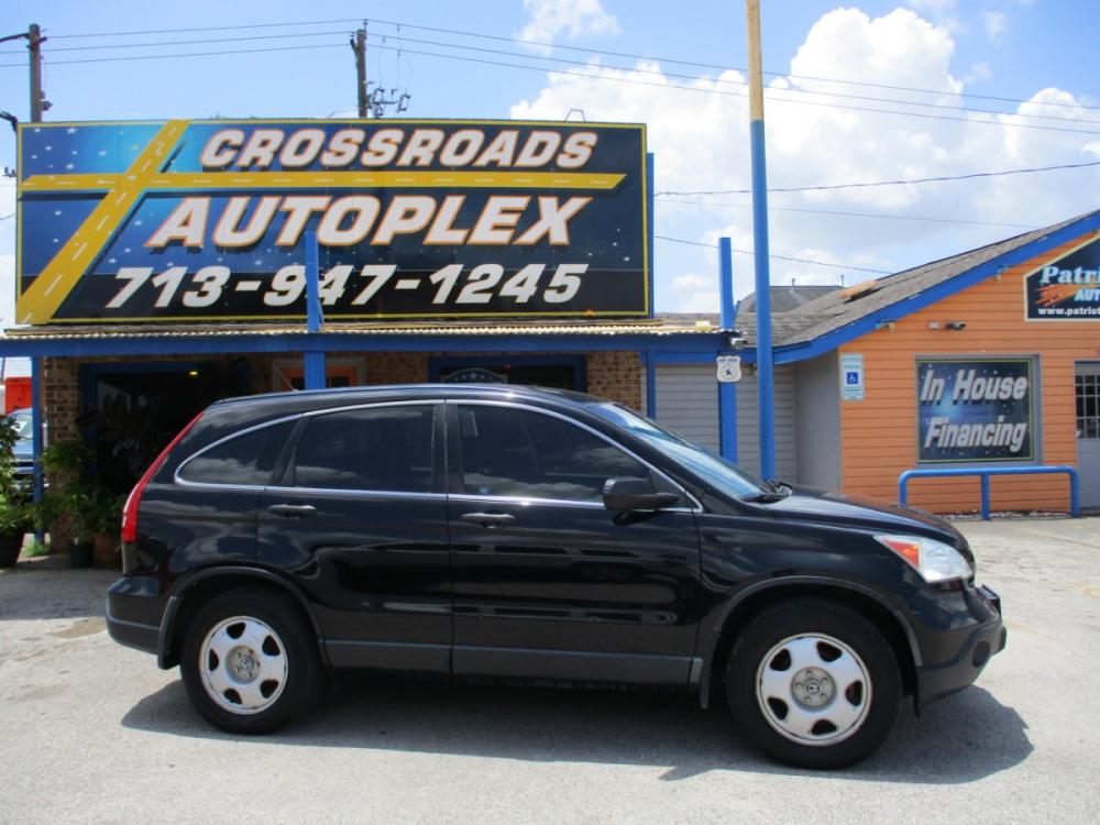 2009 BLACK HONDA CR-V LX 2WD 5-Speed AT (3CZRE38329G) with an 2.4L L4 DOHC 16V engine, 5-SPEED AUTOMATIC transmission, located at 310 Spencer Hwy, South Houston, TX, 77587, (713) 947-1245, 29.664383, -95.228897 - Photo #1
