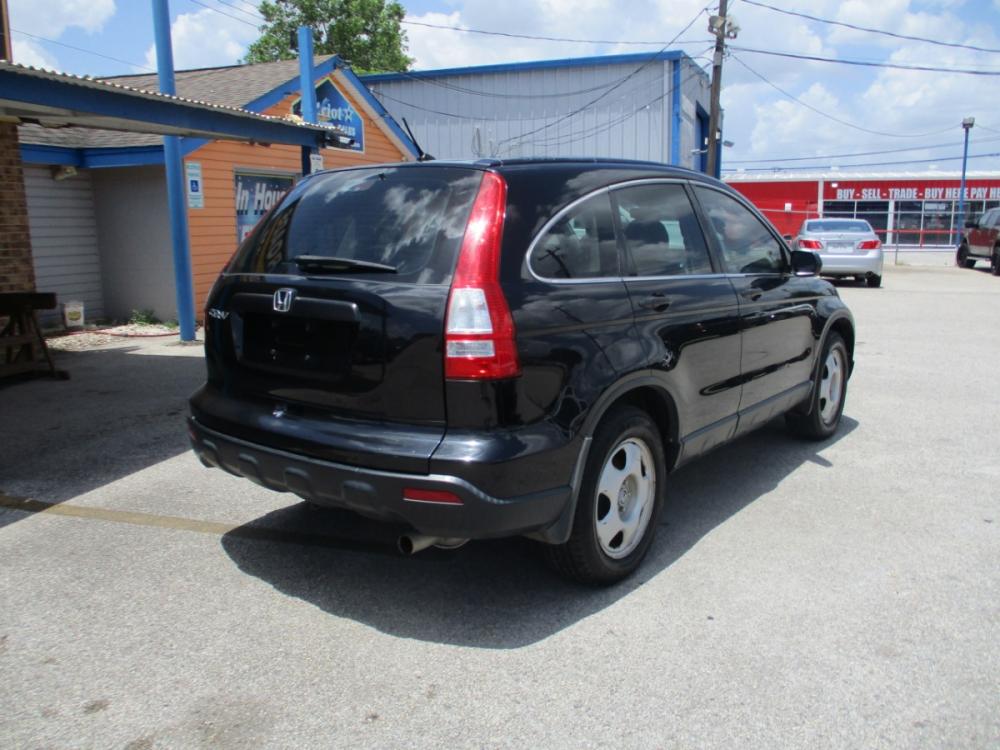 2009 BLACK HONDA CR-V LX 2WD 5-Speed AT (3CZRE38329G) with an 2.4L L4 DOHC 16V engine, 5-SPEED AUTOMATIC transmission, located at 310 Spencer Hwy, South Houston, TX, 77587, (713) 947-1245, 29.664383, -95.228897 - Photo #2