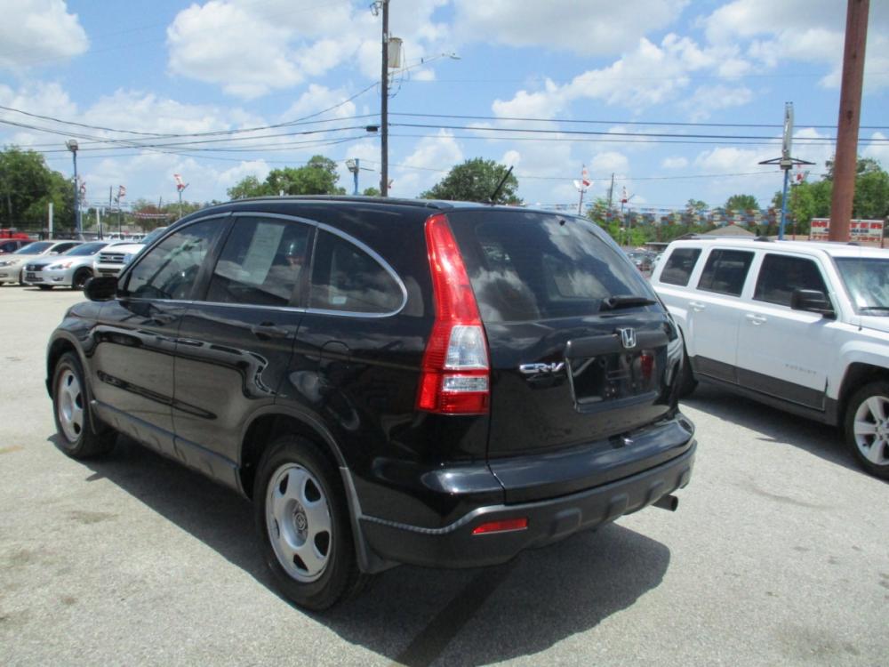 2009 BLACK HONDA CR-V LX 2WD 5-Speed AT (3CZRE38329G) with an 2.4L L4 DOHC 16V engine, 5-SPEED AUTOMATIC transmission, located at 310 Spencer Hwy, South Houston, TX, 77587, (713) 947-1245, 29.664383, -95.228897 - Photo #4
