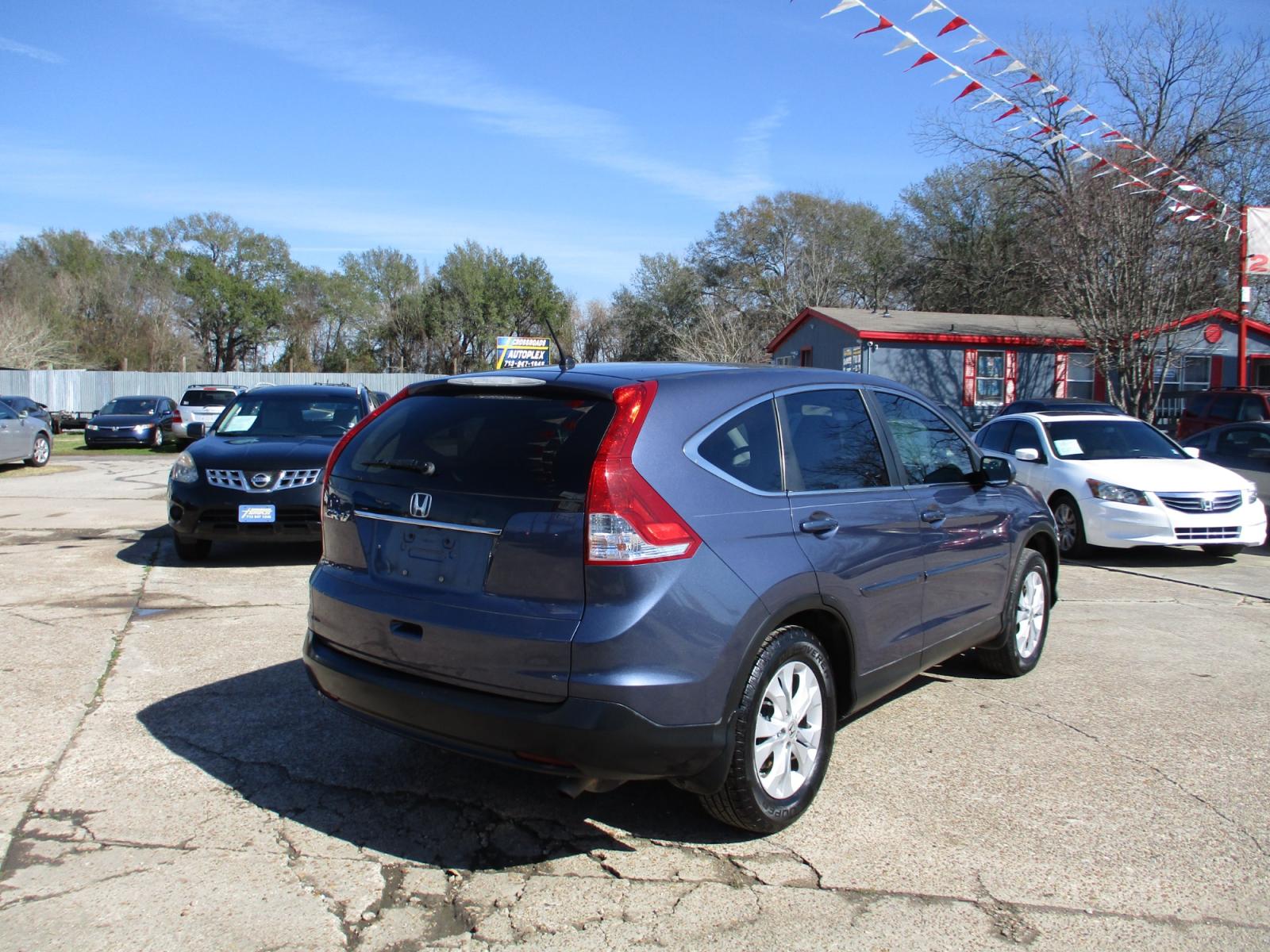 2013 BLUE HONDA CR-V EX 2WD 5-Speed AT (3CZRM3H52DG) with an 2.4L L4 DOHC 16V engine, 5-SPEED AUTOMATIC transmission, located at 19224 Kuykendahl Rd, Spring, TX, 77379, (713) 947-1245, 30.049259, -95.491402 - Photo #2