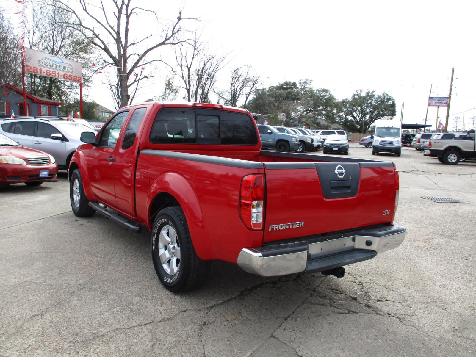 2011 RED NISSAN FRONTIER SV (1N6AD0CU9BC) with an 4.0L V6 DOHC 24V engine, 5-SPEED AUTOMATIC transmission, located at 19224 Kuykendahl Rd, Spring, TX, 77379, (713) 947-1245, 30.049259, -95.491402 - 2011 NISSAN FRONTIER CREW CAB PICK UP TRUCK!!! It gets great gas mileage and can sit 5 people! Frontier is a perfect for our special finance program. Patriot Auto Sales is a family run dealership that has strived on the same street since 1999! We are here to offer you quality vehicles at a very reas - Photo #4