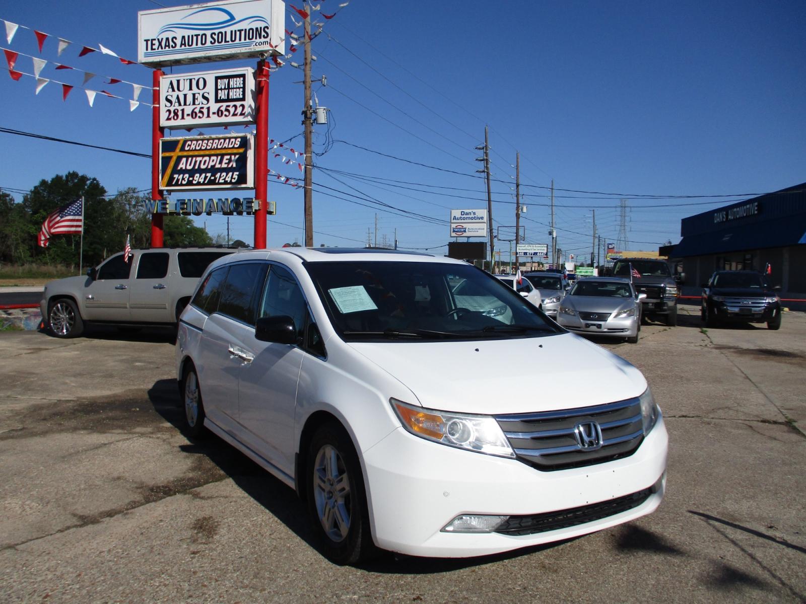 2011 WHITE /GRAY HONDA ODYSSEY Touring (5FNRL5H90BB) with an 3.5L V6 SOHC 24V engine, 5-SPEED AUTOMATIC transmission, located at 19224 Kuykendahl Rd, Spring, TX, 77379, (713) 947-1245, 30.049259, -95.491402 - used car loans/financing to South Houston TX, Pasadena TX, Galena Park TX, Jacinto City TX, Deer Park TX, Pearland TX, Cloverleaf TX, Friendswood TX, Houston TX, Channelview TX, Webster TX, West University Place TX, La Porte TX, League City TX, The Woodlands TX, Cypress TX, Spring TX Bellaire TX & S - Photo #0