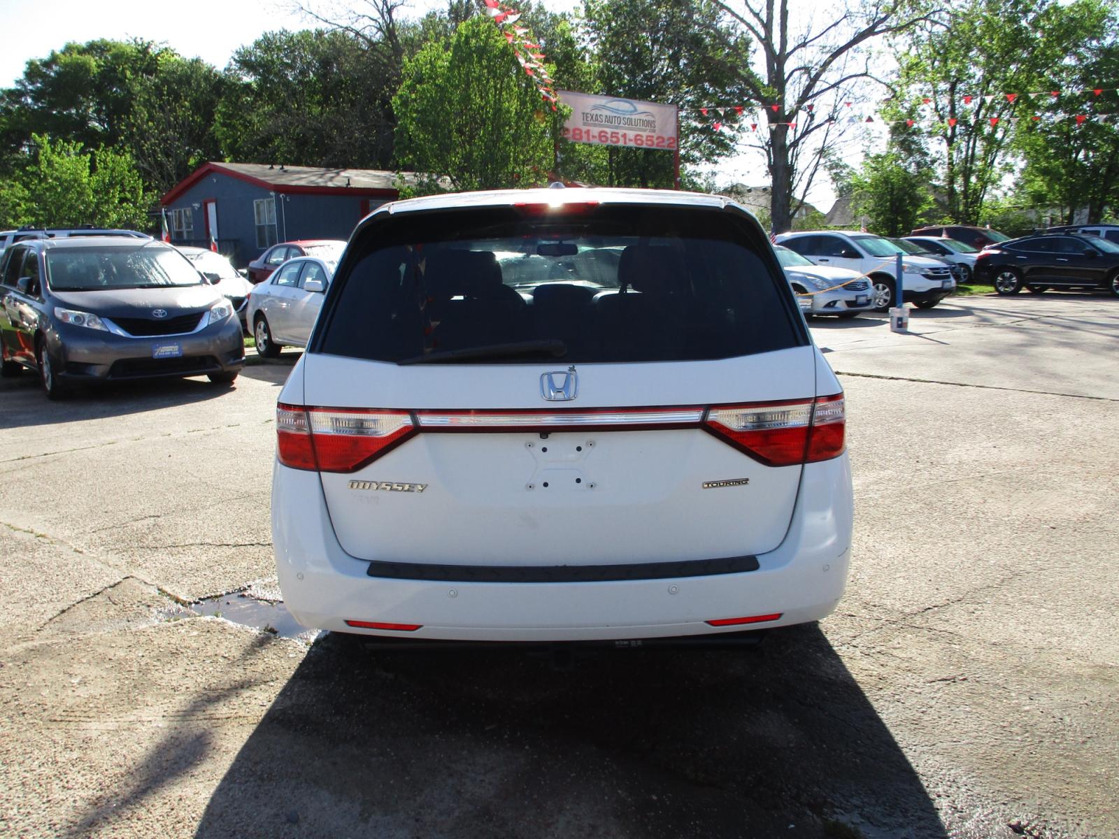 2011 WHITE /GRAY HONDA ODYSSEY Touring (5FNRL5H90BB) with an 3.5L V6 SOHC 24V engine, 5-SPEED AUTOMATIC transmission, located at 19224 Kuykendahl Rd, Spring, TX, 77379, (713) 947-1245, 30.049259, -95.491402 - used car loans/financing to South Houston TX, Pasadena TX, Galena Park TX, Jacinto City TX, Deer Park TX, Pearland TX, Cloverleaf TX, Friendswood TX, Houston TX, Channelview TX, Webster TX, West University Place TX, La Porte TX, League City TX, The Woodlands TX, Cypress TX, Spring TX Bellaire TX & S - Photo #3