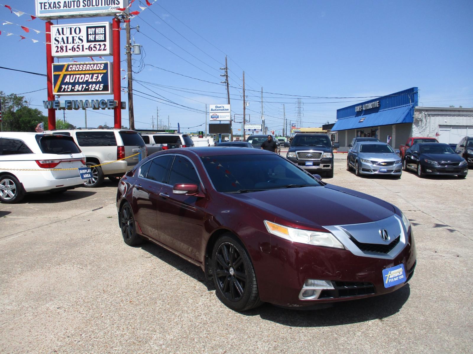 2009 MAROON ACURA TL 5-Speed AT SH-AWD with Tech Package (19UUA96529A) with an 3.7L V6 SOHC 24V engine, 5-SPEED AUTOMATIC transmission, located at 19224 Kuykendahl Rd, Spring, TX, 77379, (713) 947-1245, 30.049259, -95.491402 - NEW ARRIVAL, QUALIFIES FOR IN-HOUSE FINANCING, COLD A/C GREAT SOUND SYSTEM, ENGINE & TRANSMISSION RUN'S QUIET & SMOOTH, EXTERIOR APPEARS TO HAVE BEEN GARAGED KEPT, ALMOST NEW TIRES, NON-SMOKER, SEATS AND CARPETS ARE FREE FROM SOILS & STAINS, CALL ONE OF OUR FRIENDLY FINANCE SPECIALIST FOR EASY APPRO - Photo #0