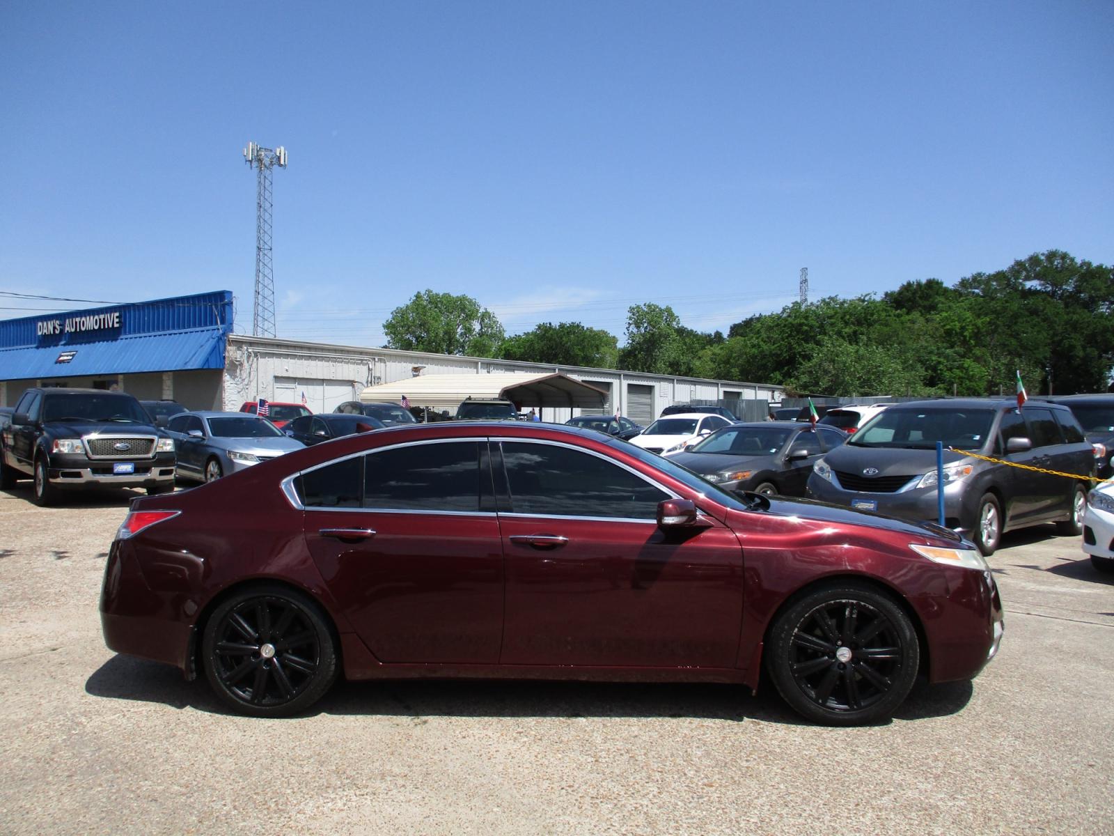 2009 MAROON ACURA TL 5-Speed AT SH-AWD with Tech Package (19UUA96529A) with an 3.7L V6 SOHC 24V engine, 5-SPEED AUTOMATIC transmission, located at 19224 Kuykendahl Rd, Spring, TX, 77379, (713) 947-1245, 30.049259, -95.491402 - NEW ARRIVAL, QUALIFIES FOR IN-HOUSE FINANCING, COLD A/C GREAT SOUND SYSTEM, ENGINE & TRANSMISSION RUN'S QUIET & SMOOTH, EXTERIOR APPEARS TO HAVE BEEN GARAGED KEPT, ALMOST NEW TIRES, NON-SMOKER, SEATS AND CARPETS ARE FREE FROM SOILS & STAINS, CALL ONE OF OUR FRIENDLY FINANCE SPECIALIST FOR EASY APPRO - Photo #1