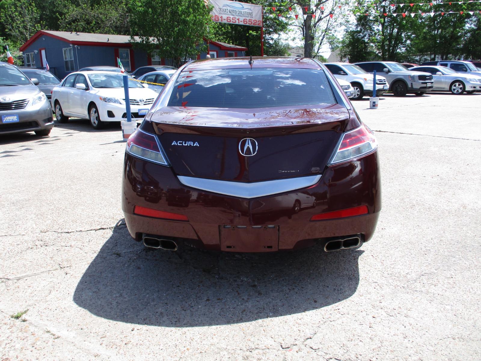 2009 MAROON ACURA TL 5-Speed AT SH-AWD with Tech Package (19UUA96529A) with an 3.7L V6 SOHC 24V engine, 5-SPEED AUTOMATIC transmission, located at 19224 Kuykendahl Rd, Spring, TX, 77379, (713) 947-1245, 30.049259, -95.491402 - NEW ARRIVAL, QUALIFIES FOR IN-HOUSE FINANCING, COLD A/C GREAT SOUND SYSTEM, ENGINE & TRANSMISSION RUN'S QUIET & SMOOTH, EXTERIOR APPEARS TO HAVE BEEN GARAGED KEPT, ALMOST NEW TIRES, NON-SMOKER, SEATS AND CARPETS ARE FREE FROM SOILS & STAINS, CALL ONE OF OUR FRIENDLY FINANCE SPECIALIST FOR EASY APPRO - Photo #3