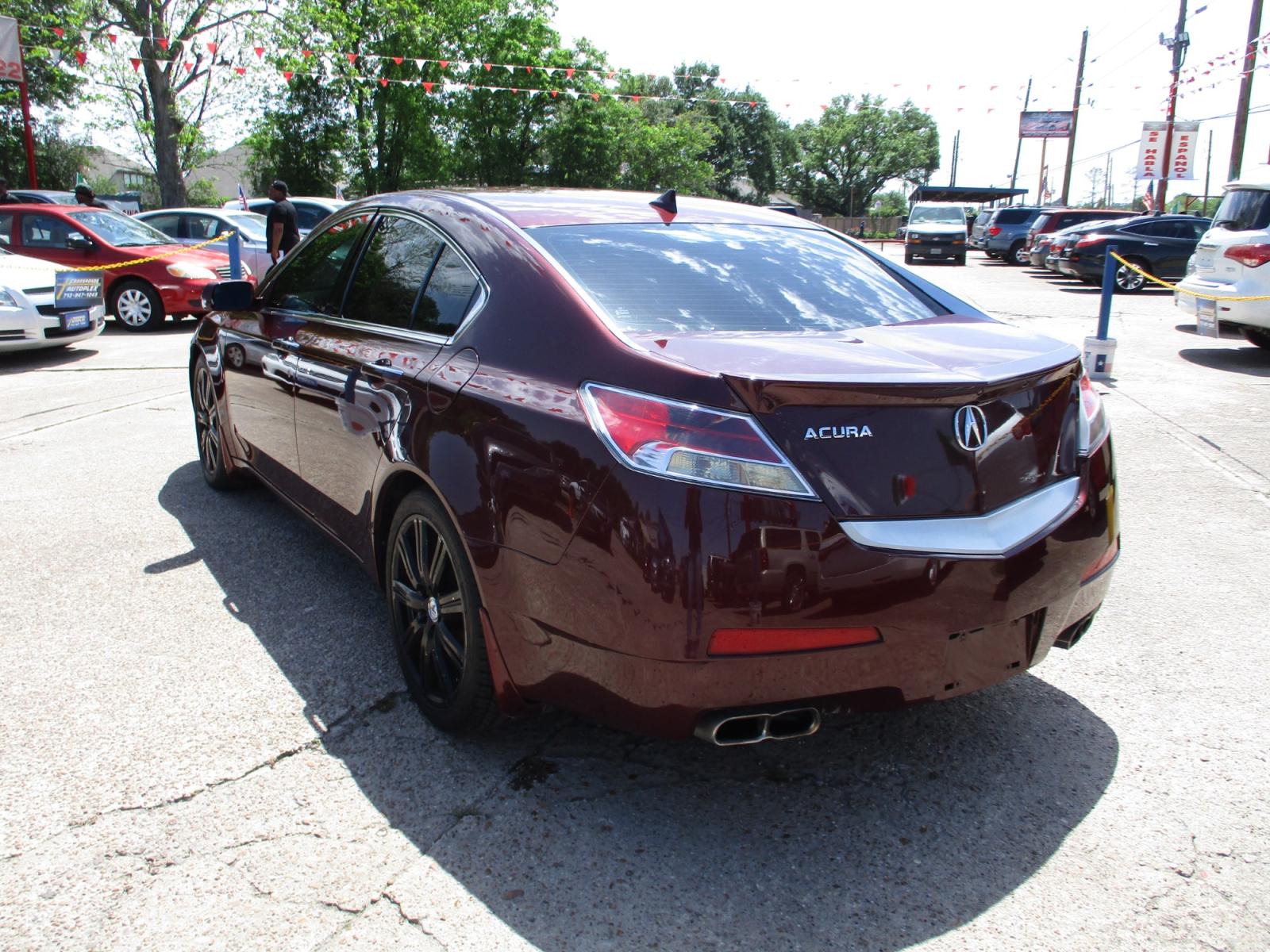 2009 MAROON ACURA TL 5-Speed AT SH-AWD with Tech Package (19UUA96529A) with an 3.7L V6 SOHC 24V engine, 5-SPEED AUTOMATIC transmission, located at 19224 Kuykendahl Rd, Spring, TX, 77379, (713) 947-1245, 30.049259, -95.491402 - NEW ARRIVAL, QUALIFIES FOR IN-HOUSE FINANCING, COLD A/C GREAT SOUND SYSTEM, ENGINE & TRANSMISSION RUN'S QUIET & SMOOTH, EXTERIOR APPEARS TO HAVE BEEN GARAGED KEPT, ALMOST NEW TIRES, NON-SMOKER, SEATS AND CARPETS ARE FREE FROM SOILS & STAINS, CALL ONE OF OUR FRIENDLY FINANCE SPECIALIST FOR EASY APPRO - Photo #4