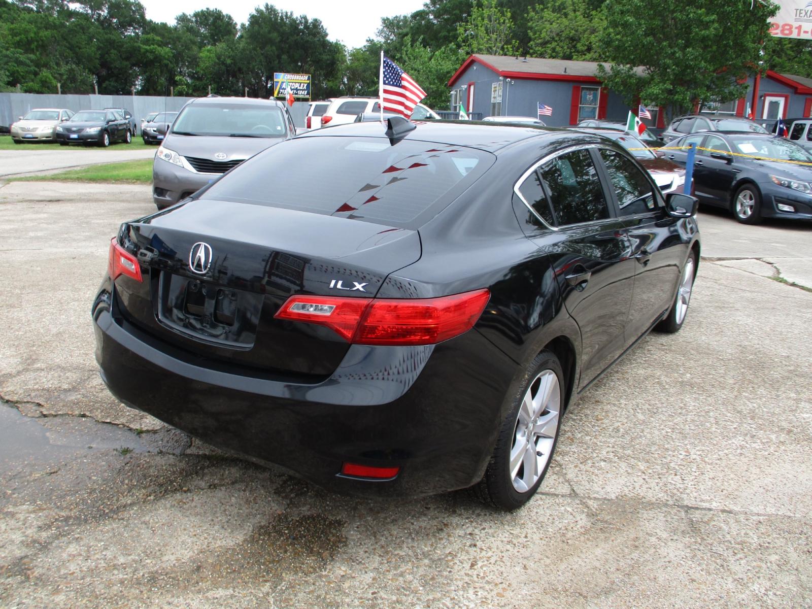 2014 BLACK /GRAY ACURA ILX 5-Spd AT w/ Premium Package (19VDE1F58EE) with an 2.0L L4 16V DOHC engine, 5-SPEED AUTOMATIC transmission, located at 19224 Kuykendahl Rd, Spring, TX, 77379, (713) 947-1245, 30.049259, -95.491402 - NEW ARRIVAL, QUALIFIES FOR IN-HOUSE FINANCING, COLD A/C GREAT SOUND SYSTEM, ENGINE & TRANSMISSION RUN'S QUIET & SMOOTH, EXTERIOR APPEARS TO HAVE BEEN GARAGED KEPT, ALMOST NEW TIRES, NON-SMOKER, SEATS AND CARPETS ARE FREE FROM SOILS & STAINS, CALL ONE OF OUR FRIENDLY FINANCE SPECIALIST FOR EASY APPRO - Photo #2
