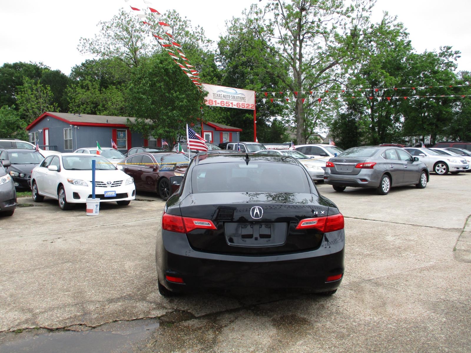 2014 BLACK /GRAY ACURA ILX 5-Spd AT w/ Premium Package (19VDE1F58EE) with an 2.0L L4 16V DOHC engine, 5-SPEED AUTOMATIC transmission, located at 19224 Kuykendahl Rd, Spring, TX, 77379, (713) 947-1245, 30.049259, -95.491402 - NEW ARRIVAL, QUALIFIES FOR IN-HOUSE FINANCING, COLD A/C GREAT SOUND SYSTEM, ENGINE & TRANSMISSION RUN'S QUIET & SMOOTH, EXTERIOR APPEARS TO HAVE BEEN GARAGED KEPT, ALMOST NEW TIRES, NON-SMOKER, SEATS AND CARPETS ARE FREE FROM SOILS & STAINS, CALL ONE OF OUR FRIENDLY FINANCE SPECIALIST FOR EASY APPRO - Photo #3