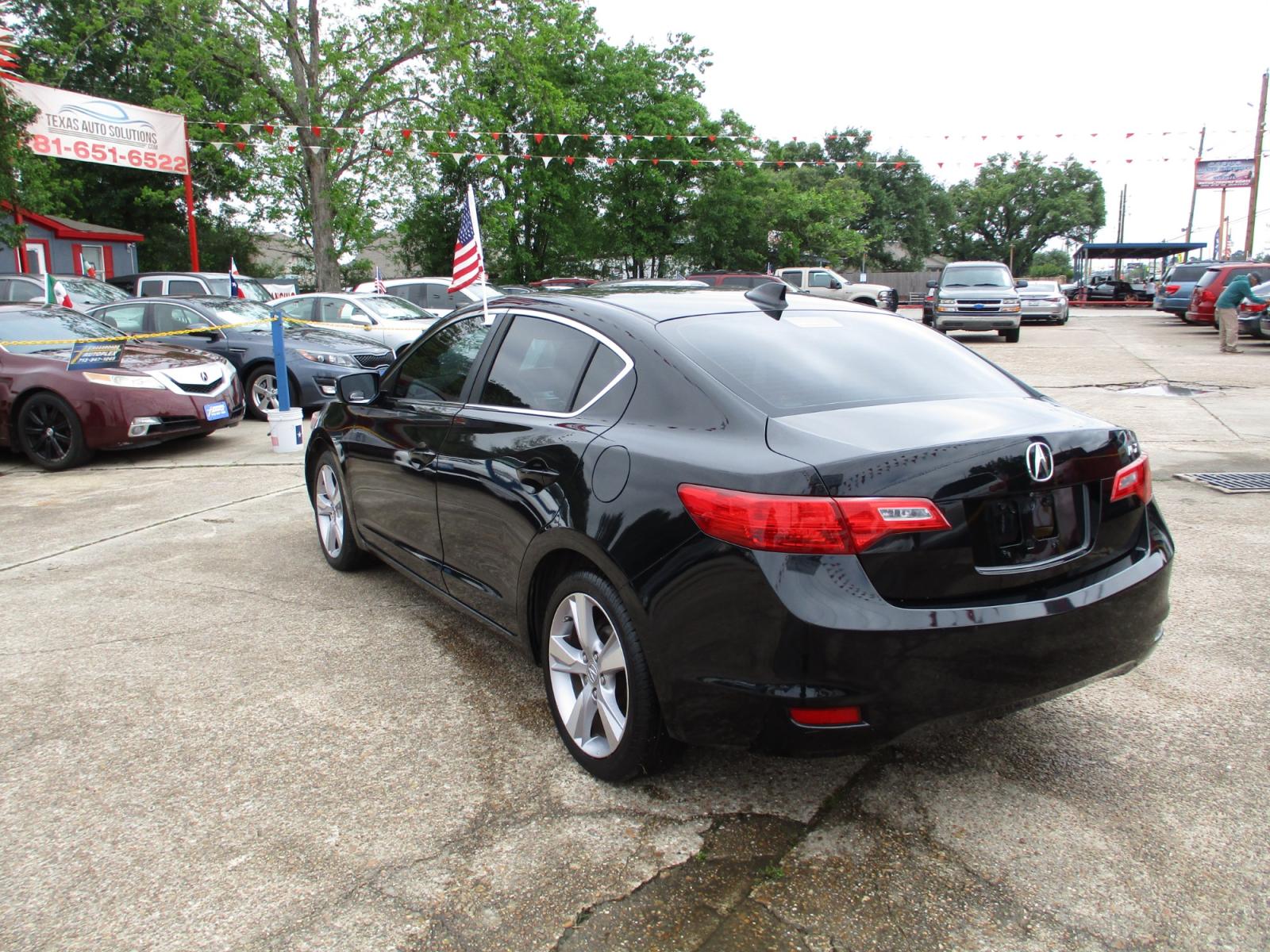2014 BLACK /GRAY ACURA ILX 5-Spd AT w/ Premium Package (19VDE1F58EE) with an 2.0L L4 16V DOHC engine, 5-SPEED AUTOMATIC transmission, located at 19224 Kuykendahl Rd, Spring, TX, 77379, (713) 947-1245, 30.049259, -95.491402 - NEW ARRIVAL, QUALIFIES FOR IN-HOUSE FINANCING, COLD A/C GREAT SOUND SYSTEM, ENGINE & TRANSMISSION RUN'S QUIET & SMOOTH, EXTERIOR APPEARS TO HAVE BEEN GARAGED KEPT, ALMOST NEW TIRES, NON-SMOKER, SEATS AND CARPETS ARE FREE FROM SOILS & STAINS, CALL ONE OF OUR FRIENDLY FINANCE SPECIALIST FOR EASY APPRO - Photo #4
