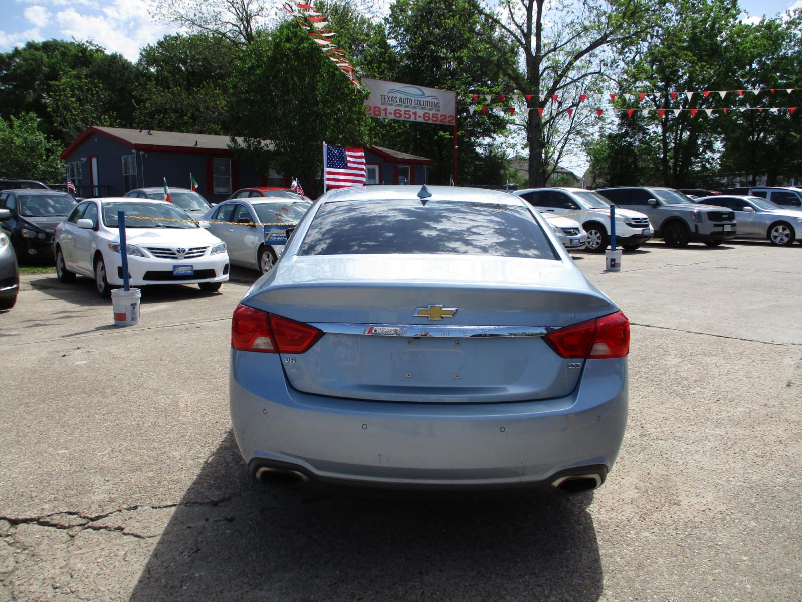 2015 BLUE /GRAY CHEVROLET IMPALA LTZ (1G1165S3XFU) with an 3.6L V6 DOHC 24V engine, 6-SPEED AUTOMATIC transmission, located at 19224 Kuykendahl Rd, Spring, TX, 77379, (713) 947-1245, 30.049259, -95.491402 - When you reach a certain age, you come to respect any product that's been around as long -- and been through as many changes -- as you have. In the automotive world, the Chevrolet Impala would be a good example -- it's been around in various incarnations since the late 1950s.This is a testament to i - Photo #3