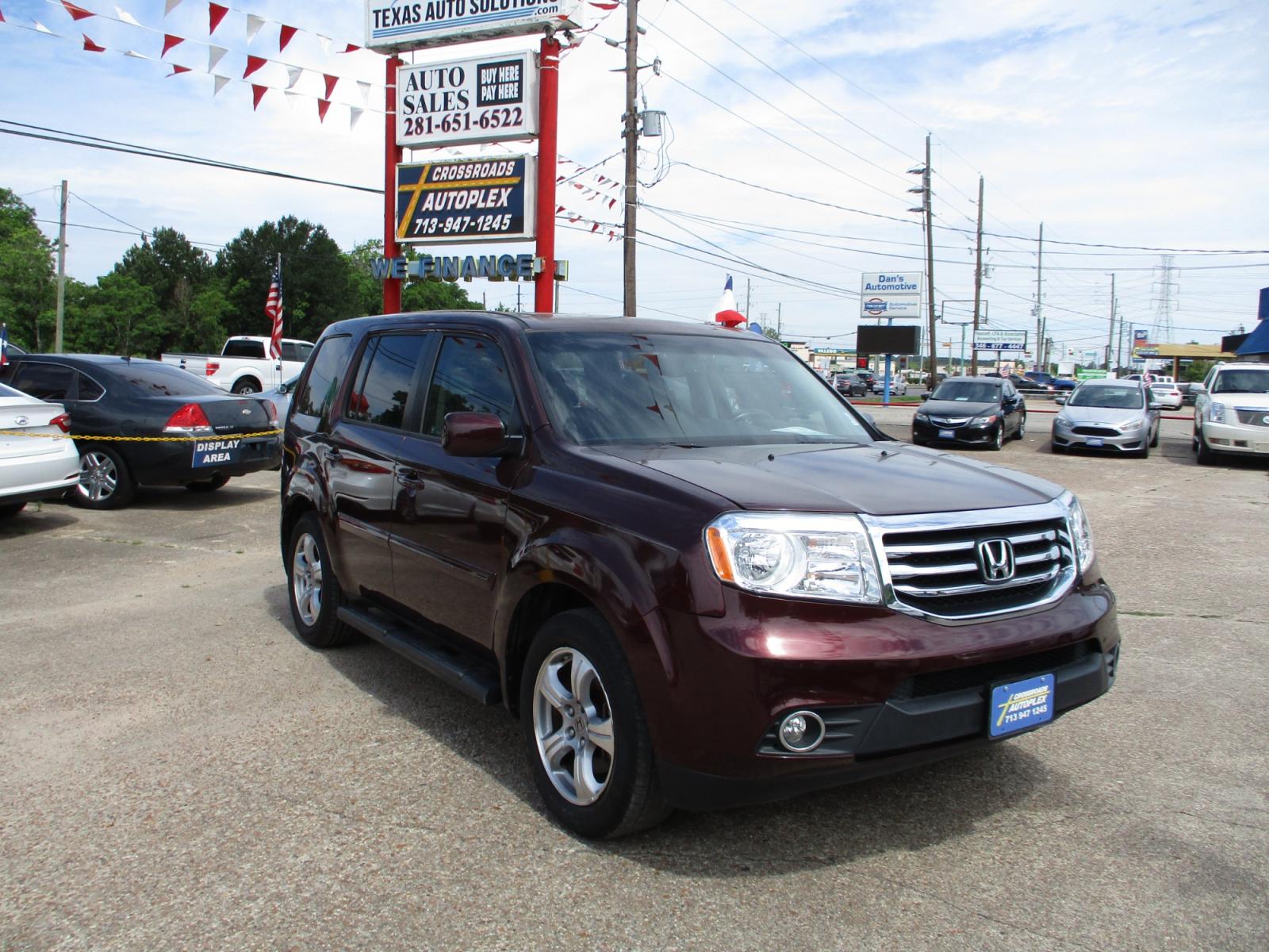 2012 MAROON HONDA PILOT EX-L 2WD 5-Spd AT (5FNYF3H5XCB) with an 3.5L V6 SOHC 24V engine, 5-SPEED AUTOMATIC transmission, located at 19224 Kuykendahl Rd, Spring, TX, 77379, (713) 947-1245, 30.049259, -95.491402 - Photo #0