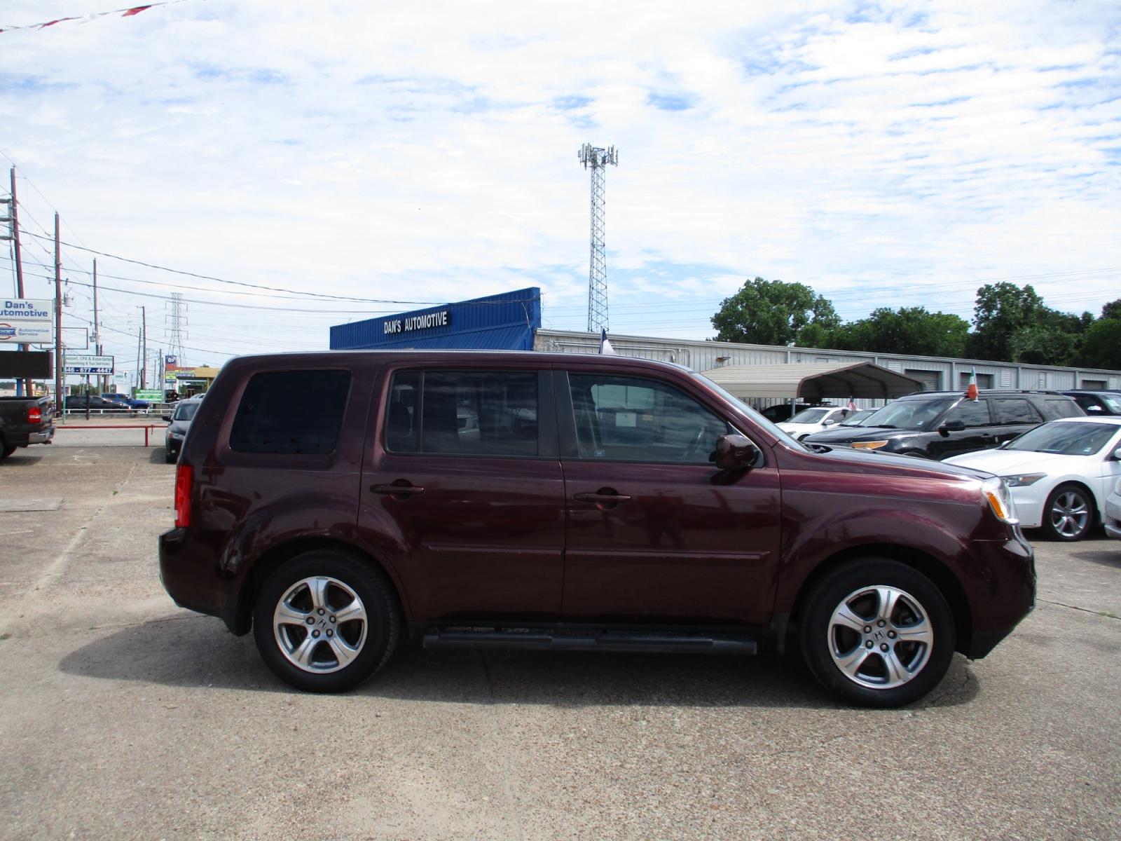 2012 MAROON HONDA PILOT EX-L 2WD 5-Spd AT (5FNYF3H5XCB) with an 3.5L V6 SOHC 24V engine, 5-SPEED AUTOMATIC transmission, located at 19224 Kuykendahl Rd, Spring, TX, 77379, (713) 947-1245, 30.049259, -95.491402 - Photo #1