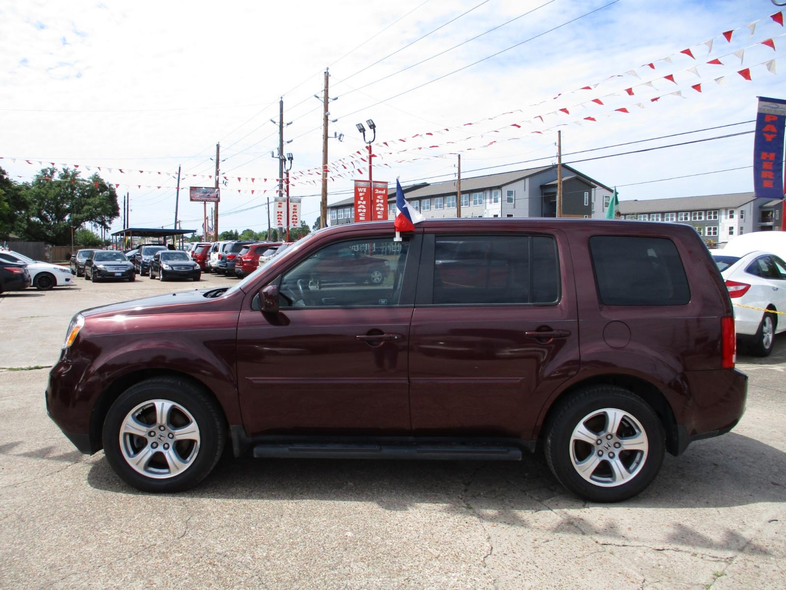2012 MAROON HONDA PILOT EX-L 2WD 5-Spd AT (5FNYF3H5XCB) with an 3.5L V6 SOHC 24V engine, 5-SPEED AUTOMATIC transmission, located at 19224 Kuykendahl Rd, Spring, TX, 77379, (713) 947-1245, 30.049259, -95.491402 - Photo #5